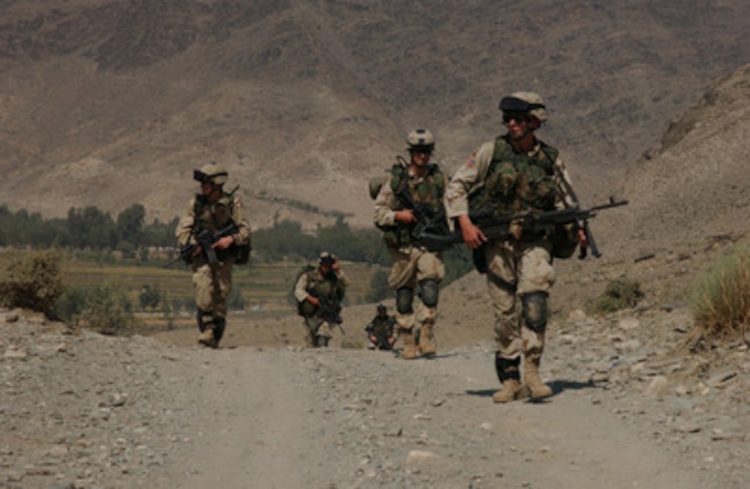 U.S. Army soldiers patrol through the region of Nowabab, Afghanistan, on Oct. 7, 2004. The soldiers are assigned to B Company, 1st Battalion, 505th Parachute Infantry Regiment. 