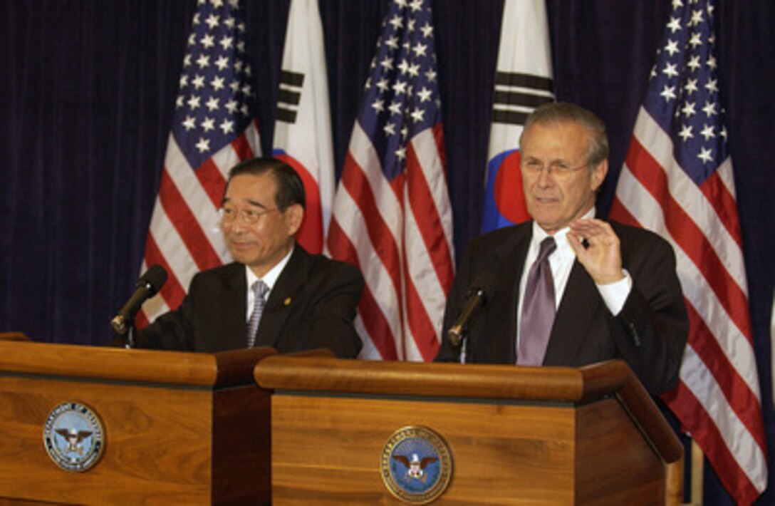 Secretary of Defense Donald H. Rumsfeld (right) and South Korean Minister of National Defense Yoon Kwang-ung conduct a joint press conference following the 36th Republic of Korea-United States security consultative meeting on Oct. 22, 2004. 