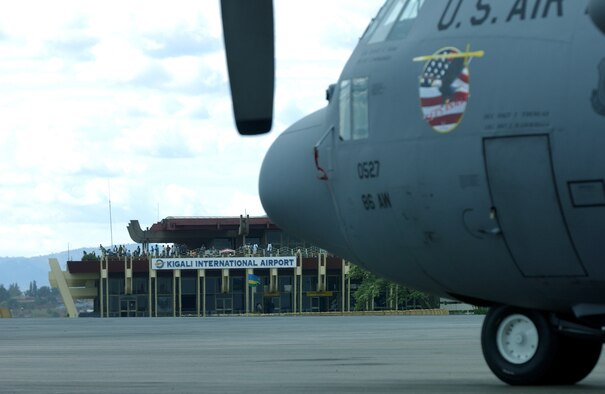 KIGALI, Rwanda -- A C-130 Hercules from Ramstein Air Base, Germany, carrying Airmen and supplies, arrives at the international airport here Oct. 24.  About 120 Airmen deployed to Rwanda to help move African Union troops to Sudan's Darfur Region.  (U.S. Air Force photo by Staff Sgt. Tony Tolley)