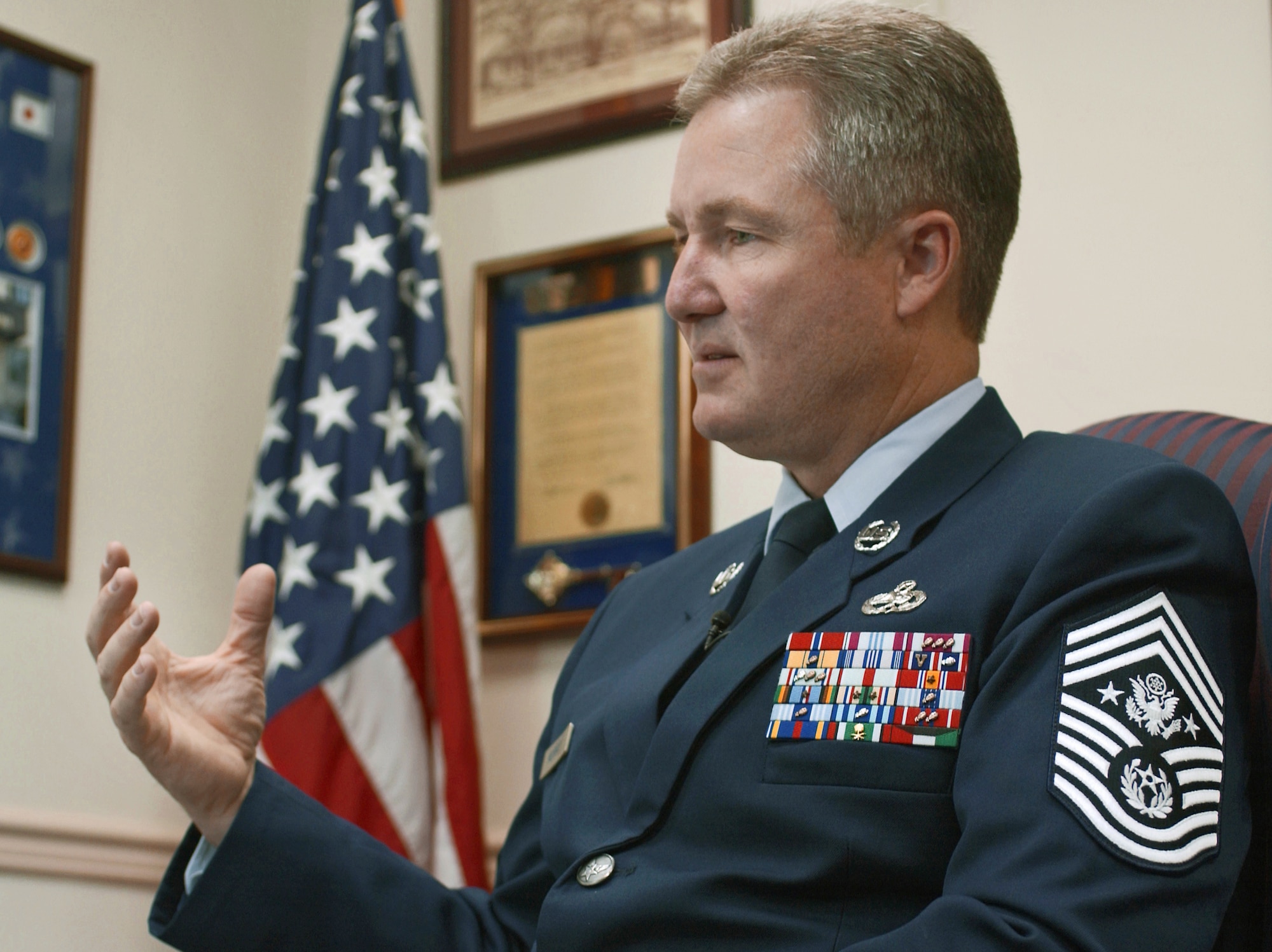 WASHINGTON -- Chief Master Sgt. of the Air Force Gerald R. Murray explains the significance of his new stripes during an interview in his Pentagon office Oct. 21.  His new insignia becomes official Nov. 1.  (U.S. Air Force photo by Master Sgt. Jim Varhegyi)