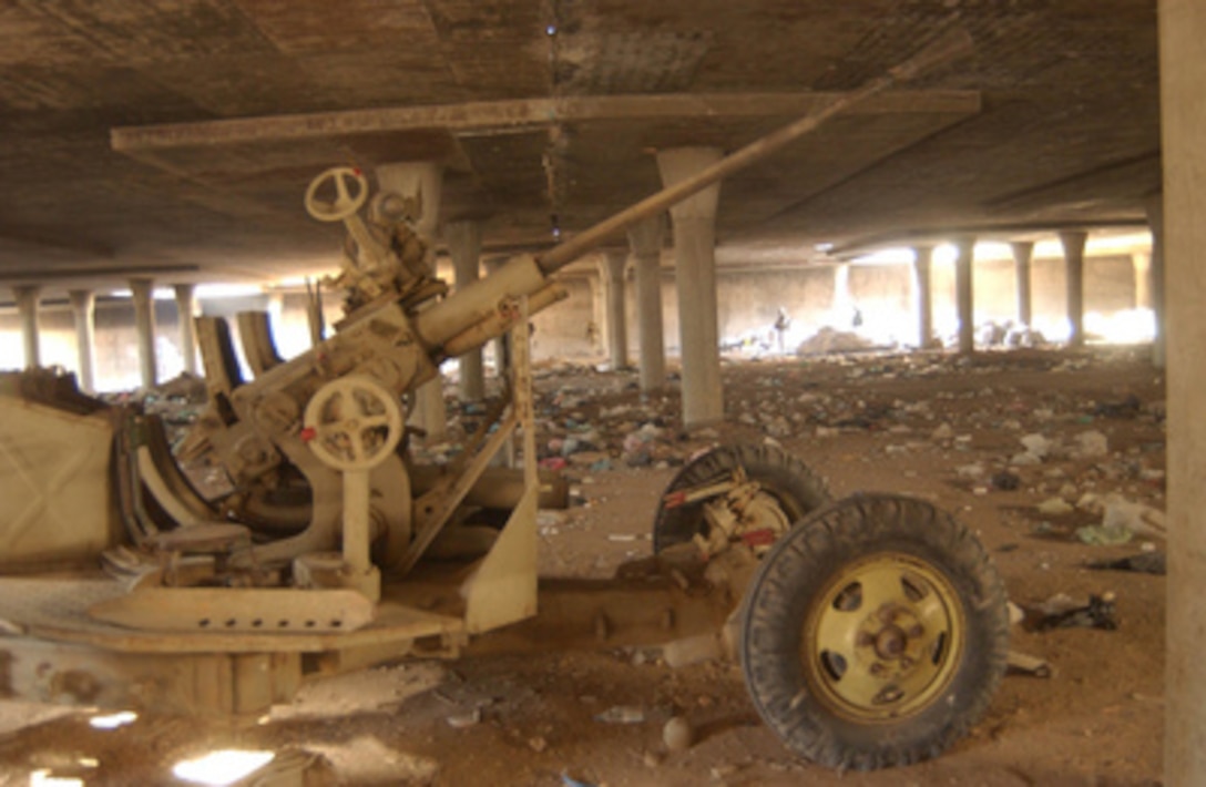 An anti-aircraft gun is part of the weapons found by U.S. Marines in a parking garage near the Imam Ali Shrine in An Najaf, Iraq, on Aug. 26, 2004. 