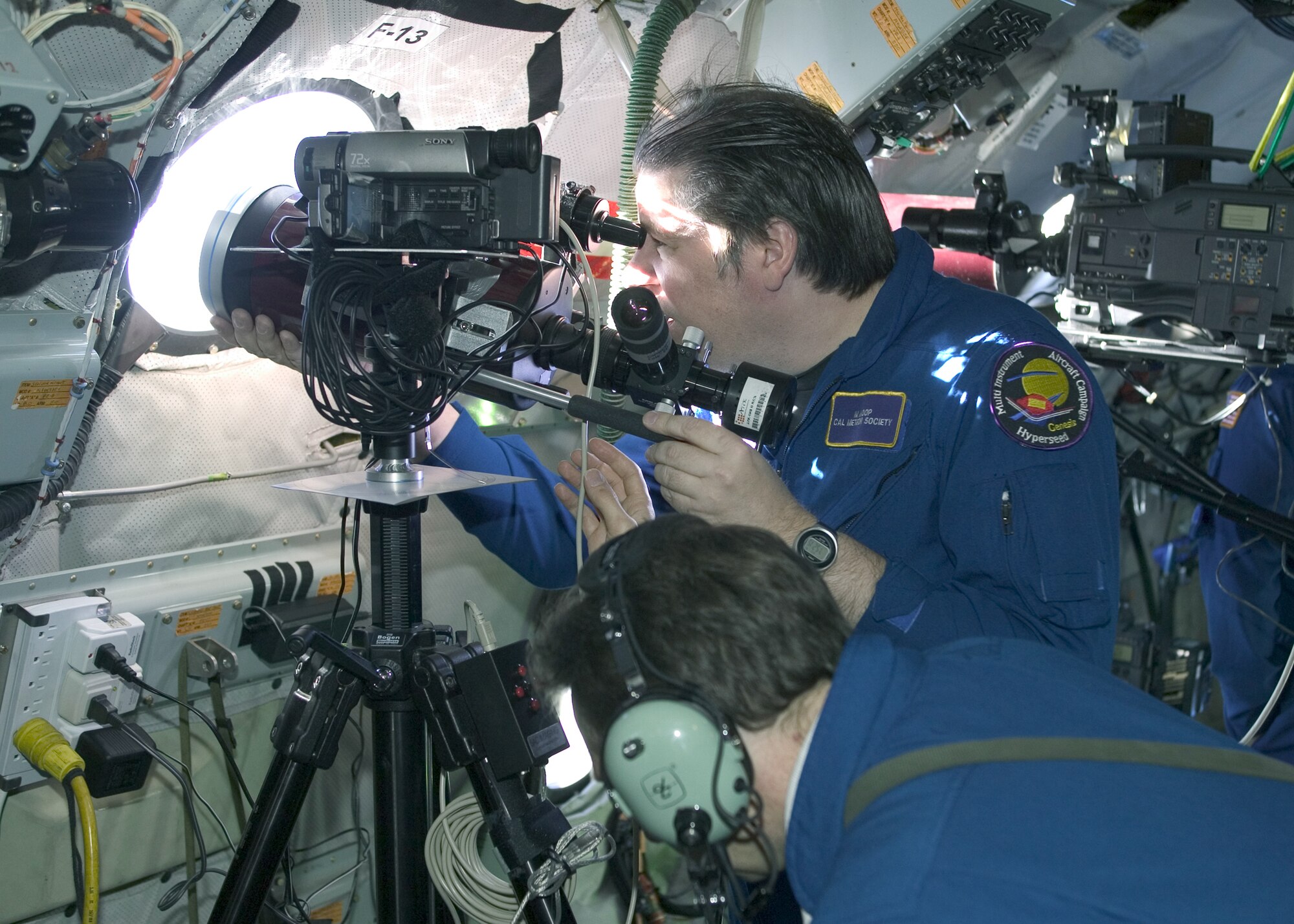 EDWARDS AIR FORCE BASE, Calif. -- Scientists onboard a specially modified NKC-135 Stratotanker, called the Flying Infrared Signature Technology Aircraft, observe NASA's Genesis spacecraft re-entering the Earth's atmosphere Sept. 8.  (U.S. Air Force photo by Bobbi Garcia)