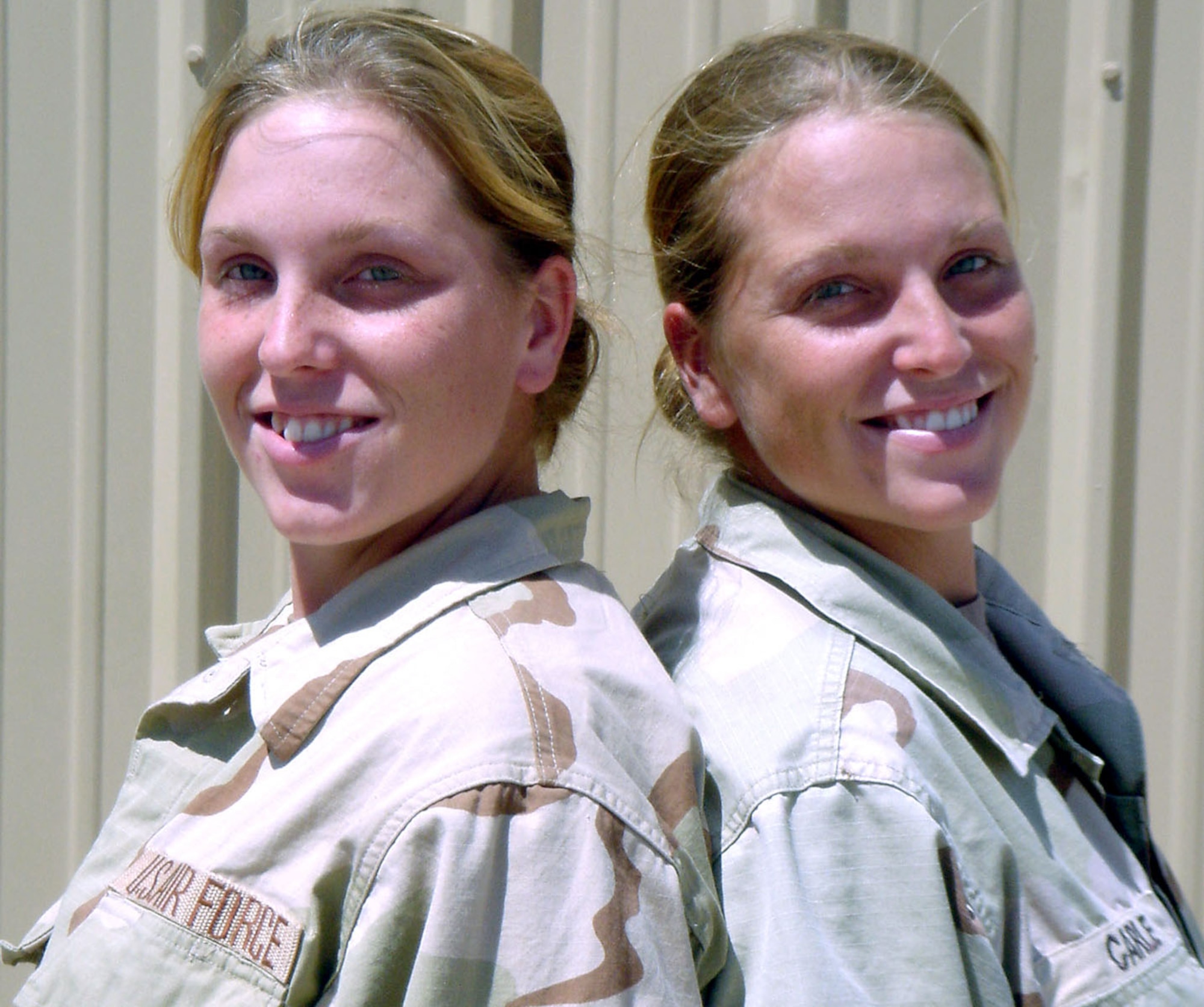 BALAD AIR BASE, Iraq -- Staff Sgts. Sharon and Lerinda Carle joined the Air Force two weeks after graduating from high school in Silverton, Idaho.  They are currently deployed together here.  (U.S. Air Force photo by Capt. Shellie L. Russell)