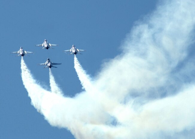 OVER ELLSWORTH AIR FORCE BASE, S.D. - The U.S. Air Force Demonstration Team "Thunderbirds" practice here recently.  The Thunderbirds readied themselves for Dakota Thunder 2004, Ellsworth's annual air show.   (U.S. Air Force photo by Staff Sgt. Jamie Amidon) 