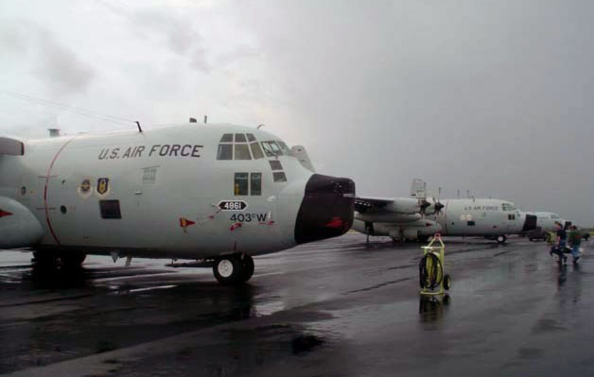 HOMESTEAD AIR RESERVE BASE, Fla. -- WC-130 aircraft from the 403rd Wing at Keesler Air Force Base, Miss., sit on the ramp here Sept. 15.  Hurricane Ivan threatened Keesler and the Gulf Coast, so the "Hurricane Hunters" moved their flying operation here.  (U.S. Air Force photo by Kathy Paine)