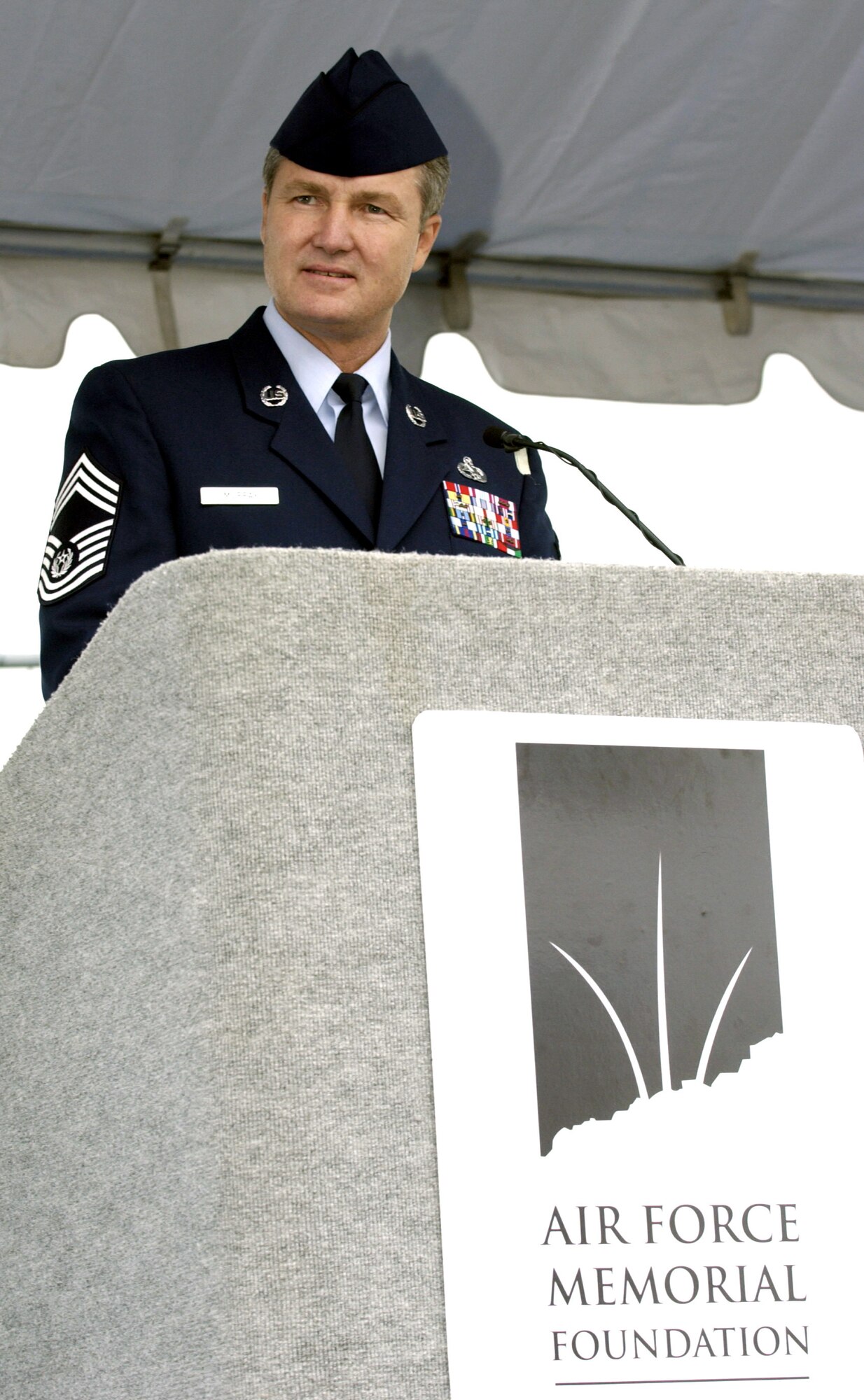 ARLINGTON, Va. -- Chief Master Sgt. of the Air Force Gerald R. Murray addresses hundreds of people gathered for the official groundbreaking and site dedication ceremony on the site of the future national Air Force Memorial on Sept. 15.  The 270-foot tall memorial is designed to honor all those who have served in the U.S. Air Force and its predecessor organizations.  (U.S. Air Force photo by Master Sgt. Jim Varhegyi)