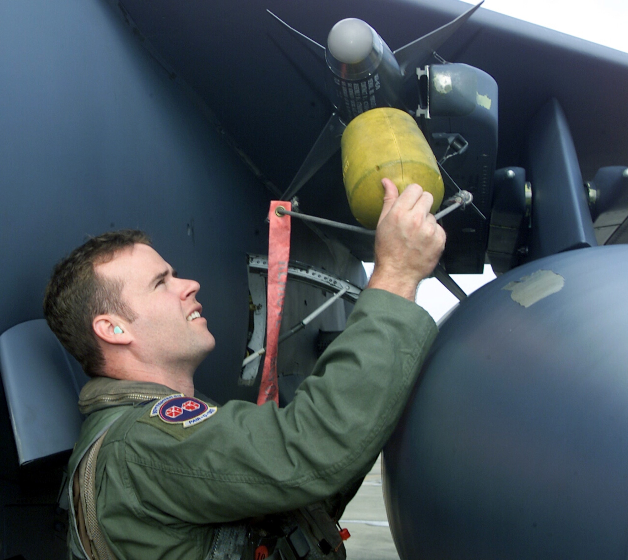 GWANGJU AIR BASE, South Korea -- Capt. Greg Priesser completes preflight checks before flying a sortie Sept. 15.  He is one of more than 100 people here whose family and friends were affected by hurricanes Charley, Frances and Ivan.  Captain Priesser is a 3rd Air Expeditionary Group F-15E Strike Eagle pilot and flight safety officer.  (U.S. Air Force photo by Staff Sgt. Steven R. Nabor)