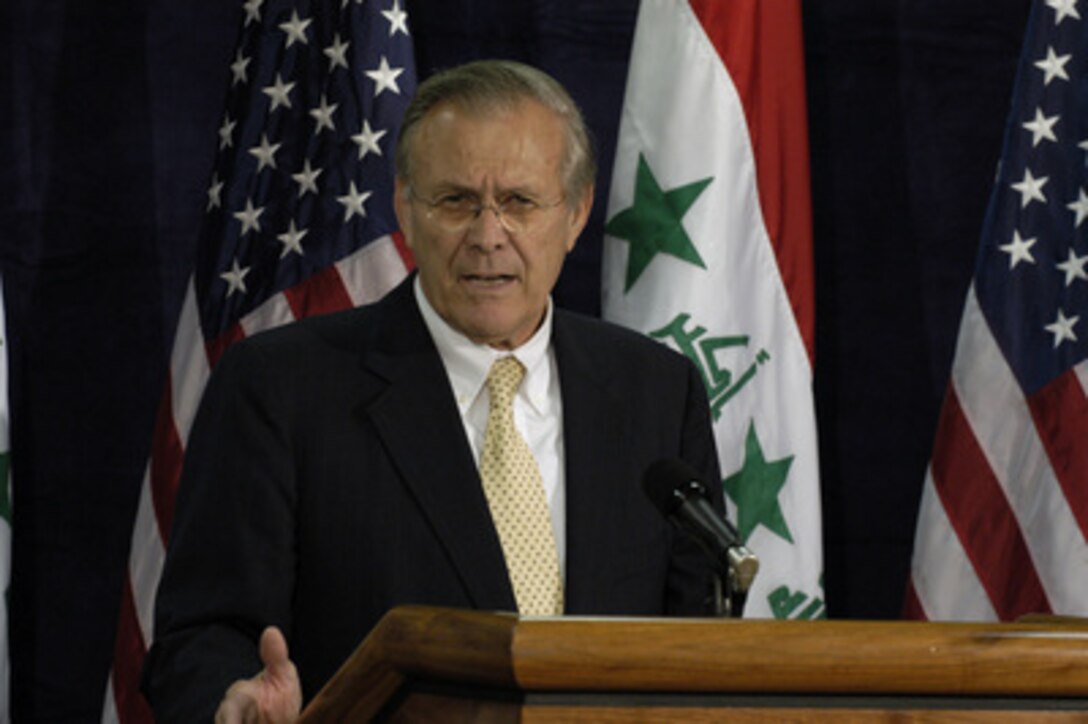 Secretary of Defense Donald H. Rumsfeld conducts a press availability in the Pentagon following his meeting with Prime Minister Ayad Allawi of Iraq on Sept. 24, 2004. Rumsfeld and Allawi met earlier to discuss the progress of democracy in Iraq. 