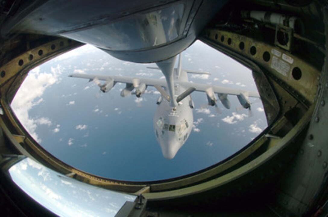 A U.S. Air Force C-130E Hercules is refueled by a KC-135 Stratotanker over the Pacific Ocean on Sept. 20, 2004. The Hercules is attached to the 1st Special Operations Squadron, Kadena Air Base, Japan. The Stratotanker is with the 909th Air Refueling Squadron which provides combat-ready KC-135 tanker aircrews to support peacetime operations and all levels of conflict in the Pacific Theatre. 