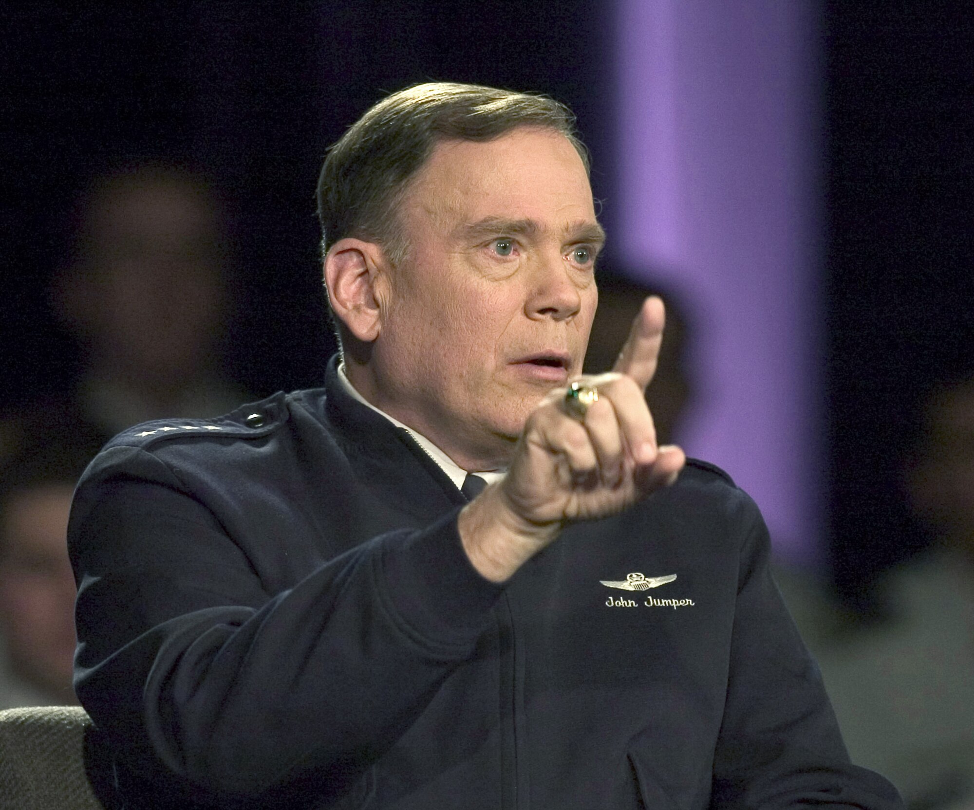 U.S. AIR FORCE ACADEMY, Colo. -- Air Force Chief of Staff Gen. P. John Jumper speaks to the audience during the town hall meeting here Sept. 27.  Joining the general were Secretary of the Air Force Dr. James G. Roche and Chief Master Sgt. of the Air Force Gerald R. Murray.  The event was broadcast on The Pentagon Channel and American Forces Radio and Television Service stations worldwide.  (U.S. Air Force photo by Charley Starr)