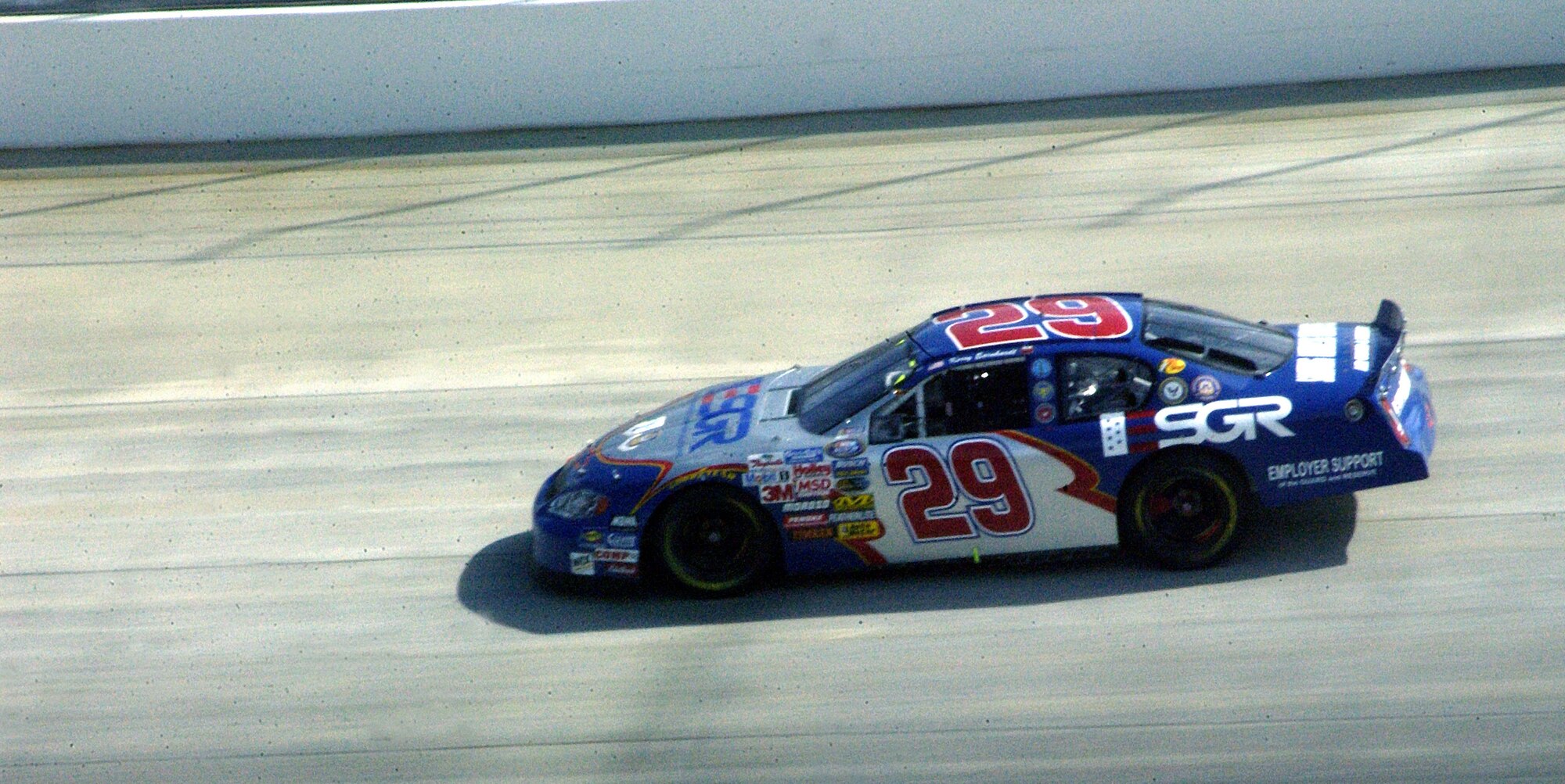DOVER INTERNATIONAL SPEEDWAY, Del. -- Flying the colors of the Employer Support of the Guard and Reserve, driver Kerry Earnhardt races here Sept. 25 during the NASCAR Busch Series Race.  ESGR is a Defense Department volunteer organization that provides free education and consultation for employers of guardsmen and reservists.  Its goal is to support America's employers who share their employees with the nation to ensure national security.  Mr. Earnhardt finished 23rd.  (U.S. Air Force photo by Tech. Sgt. Jason Tudor)