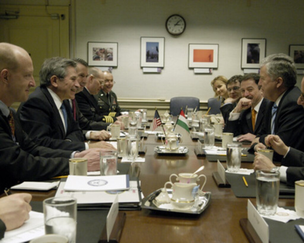 Deputy Secretary of Defense Paul Wolfowitz (second from left) meets with Hungarian Minister of Foreign Affairs Ferenc Somogyi in the Pentagon on April 1, 2005. Wolfowitz and Somogyi are meeting to discuss issues of mutual interest. From left to right: Deputy Assistant Secretary of Defense for NATO and European Policy Ian Brzezinski, Wolfowitz, Director for Southern Europe Policy Anthony Aldwell, Joint Staff Captain Chip Jaenichen, U.S. Navy, Senior Military Assistant to the Deputy Secretary of Defense Brig. Gen. Frank Helmick, U.S. Army, First Secretary, Political Counselor Dr. Maria Vass, Chief of Cabinet Ferenc Jari, Hungarian Ambassador to the U.S. Andras Simonyi, Somogyi. 