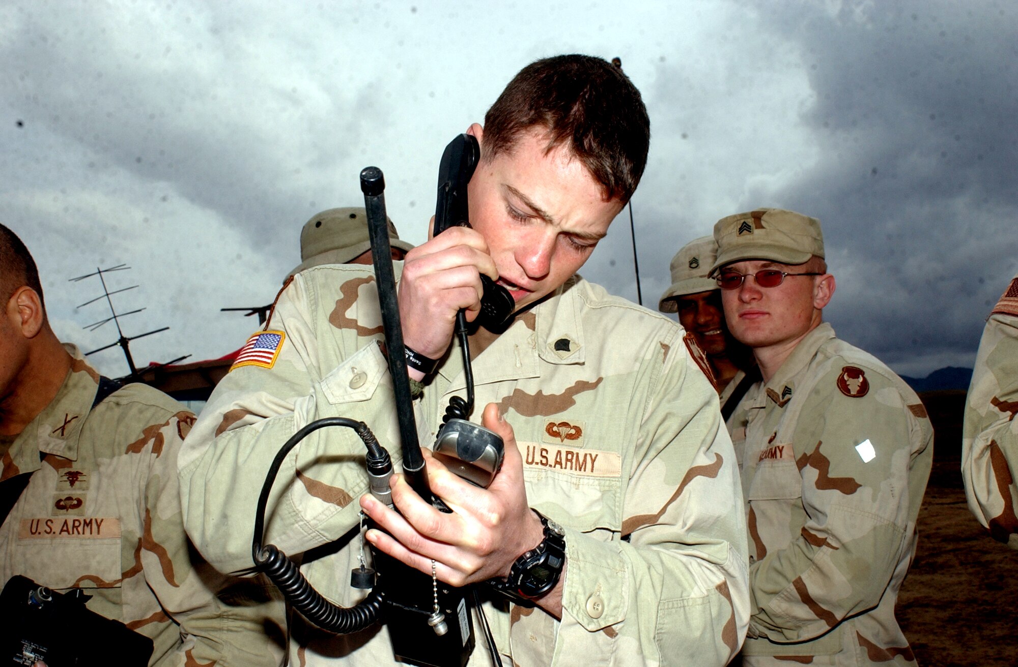 FORWARD OPERATING BASE RIPLEY, Afghanistan -- Army Spc. James Mayer, a forward observer for the 5th Infantry Regiment consults his GPS locator as he recites his position to pilots during emergency close-air-support training.  (U.S. Army photo by Sgt. Stephanie L. Carl)