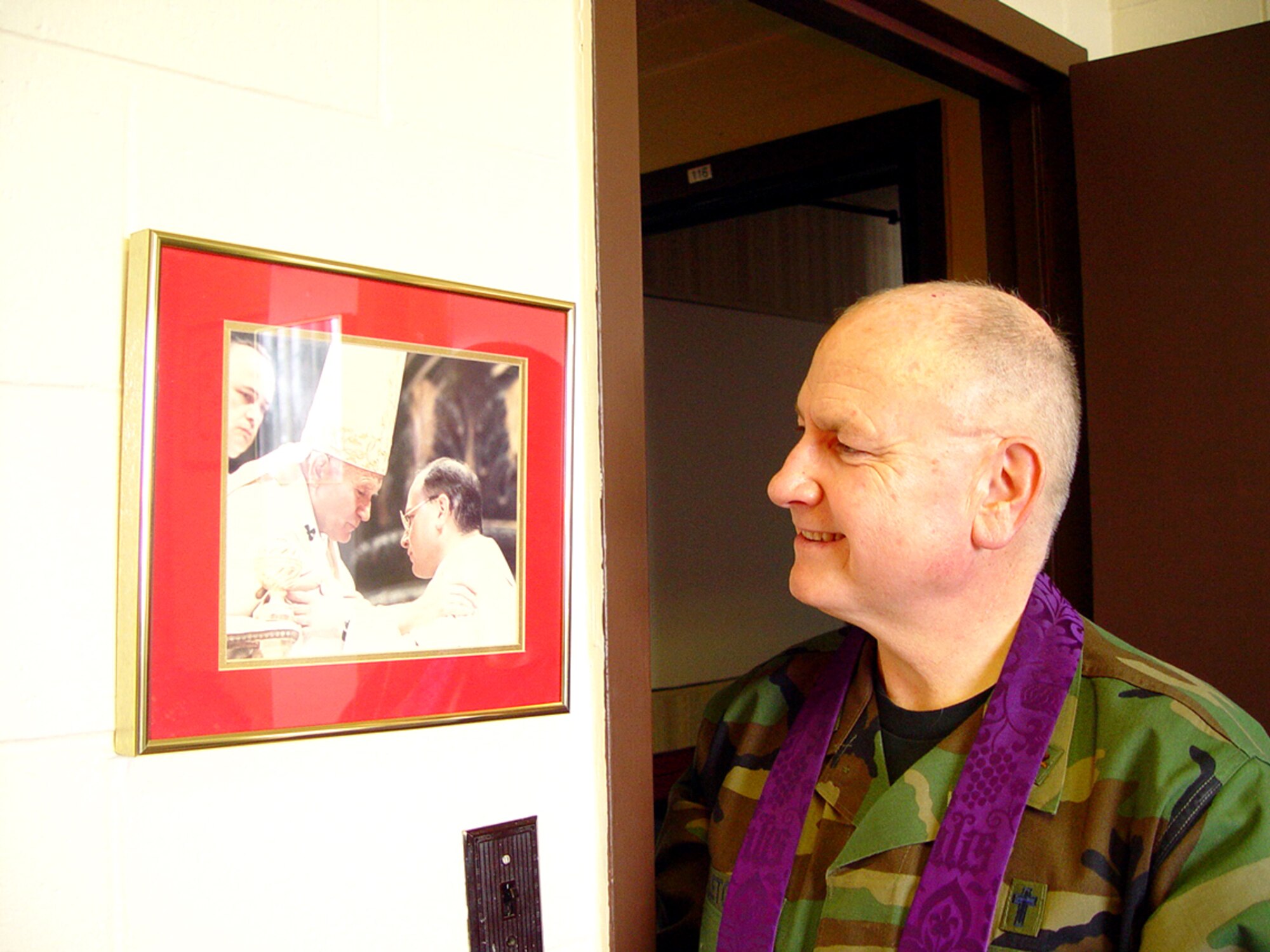 ELMENDORF AIR FORCE BASE, Alaska -- Chaplain (Maj.) Patrick Fletcher, a Catholic priest here, fondly recollects his personal experiences with the late Pope John Paul II.  Chaplain Fletcher was ordained a priest by the pope in 1985 and joined the Air Force in 1989.  (U.S. Air Force photo by Senior Airman Austin May)                       