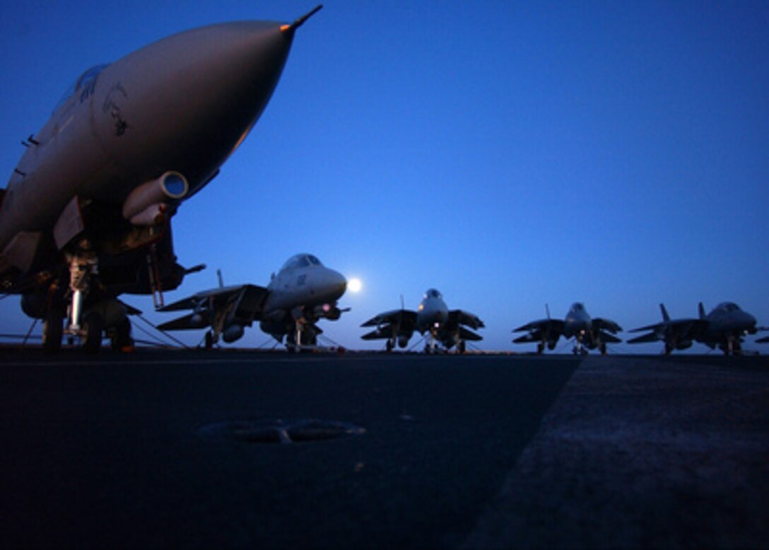 Five Navy F-14B Tomcats are chained-down on the fantail of the aircraft carrier USS Harry S. Truman (CVN 75) as the ship operates in the Red Sea on March 26, 2005. The Harry S. Truman Carrier Strike Group is transiting to the Mediterranean Sea after completing nearly four months in the Persian Gulf in support of the war on terror. 