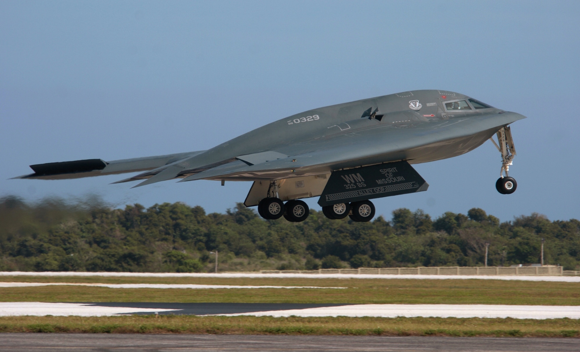 ANDERSEN AIR FORCE BASE, Guam -- A B-2 Spirit bomber, from the 509th Bomb Wing at Whiteman Air Force Base, Mo., takes off for a mission during an air and space expeditionary force deployment here.  The B-2s deployed here Feb. 25 to provide U.S. Pacific Command officials a continuous bomber presence in the Asia-Pacific region, enhancing regional security and the U.S. commitment to the Western Pacific.  Bomber aircraft have had an ongoing presence on the island since February 2004.  (U.S. Air Force photo by Master Sgt. Val Gempis)