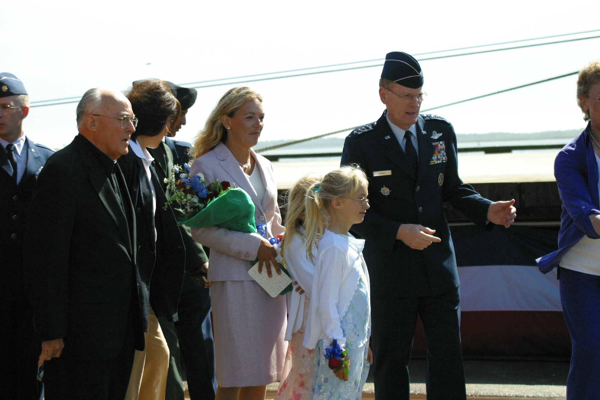 SUNNY POINT, N.C. -- Gen. John W. Handy greets the family of Tech. Sgt. John Chapman at the naming of a Military Sealift Command vessel in Chapman’s honor. General Handy is Air Mobility Command and Transportation Command commander. (U.S. Air Force photo by Lisa Terry McKeown)