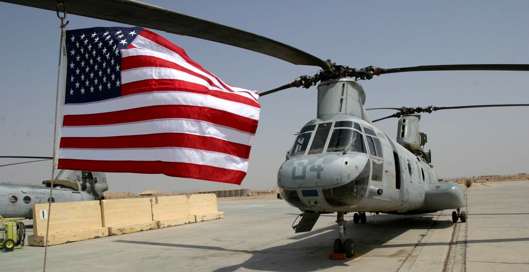 Marine Medium Helicopter Squadron 165 (REIN), 15th Marine Expeditionary Unit (Special Operations Capable), showed their patriotism by hanging flags from their helicopter blades just before flying out of Iraq. The 15th MEU (SOC) is wrapping up one month of security and stabilization operations in the Greater Baghdad area.