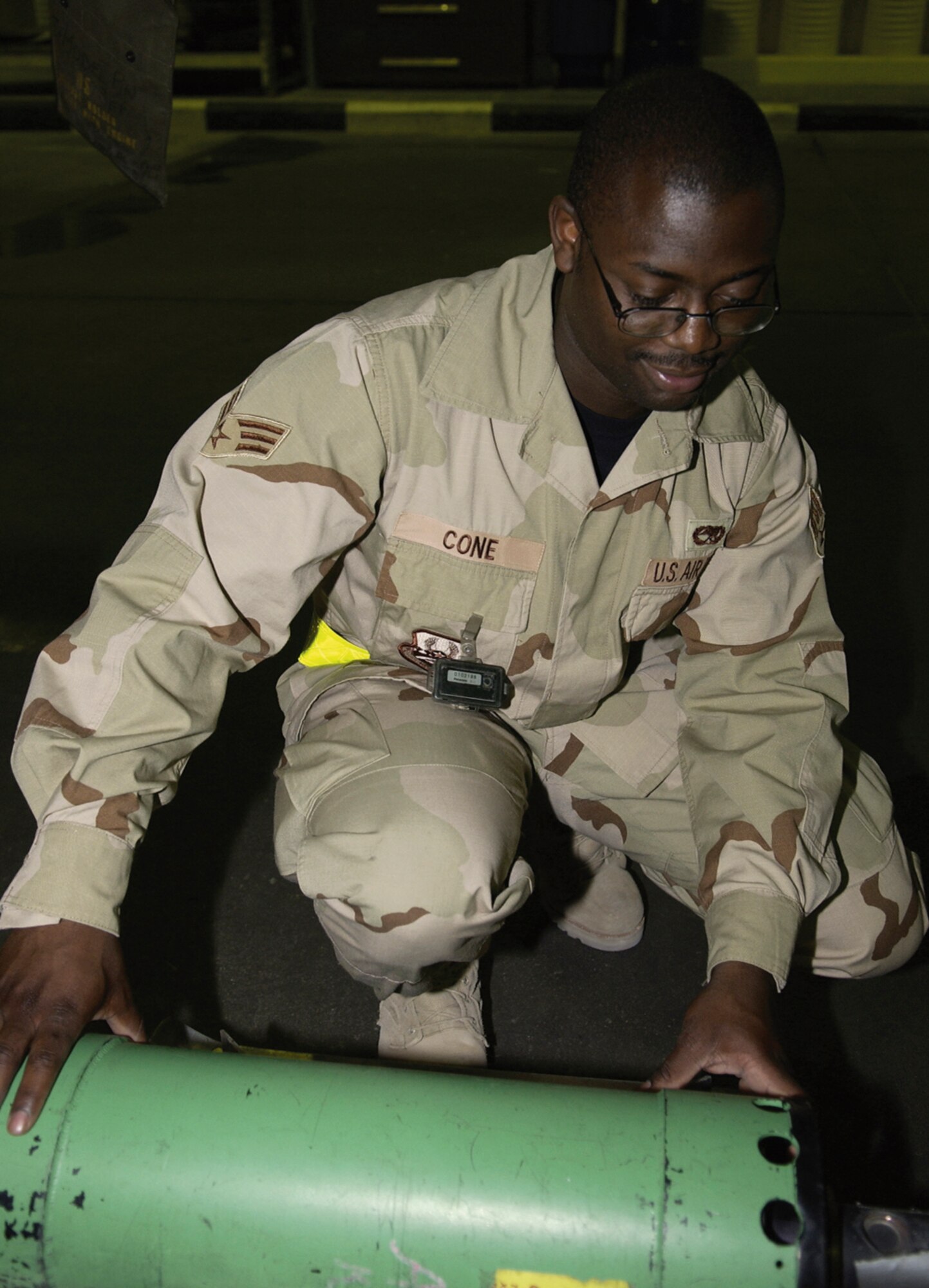 SOUTHWEST ASIA -- Senior Airman James Cone prepares for an inspection.  He is assigned to the 379th Expeditionary Maintenance Squadron's nondestructive inspection lab at a forward-deployed location and is from Dyess Air Force Base, Texas.  (U.S. Air Force photo by Senior Master Sgt. John Snow)

