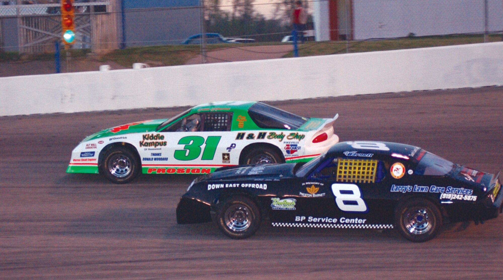 KENLY, N.C. -- Master Sgt. Warren Howard pushes his No. 31 car past a competitor to finish fifth during a race recently at the Southern National Speedway here.  He has raced cars since he was 16 years old and is the environmental coordinator with the 4th Equipment Maintenance Squadron.  (U.S. Air Force photo by Airman Frank Snider)