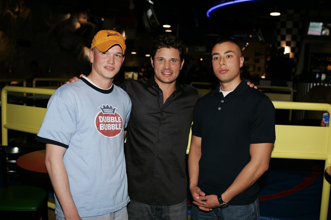 102921_0635 -- NICK & JESSICA'S TOUR OF DUTY - America's favorite young married couple, Nick Lachey and Jessica Simpson, multi-platinum artists known from their hit MTV series "Newlyweds," take their variety show on the road to star in "Nick & Jessica's Tour of Duty." In the vein of the popular Bob Hope classics, Nick and Jessica will travel overseas to bring a touch of home to our men and women in uniform. Like their previous specials, the duo will showcase their singing and comedic talents in musical performances with such guests as Willie Nelson, Big & Rich, Brian McKnight, Jimmy Kimmel and Drew Lachey, plus they'll be delivering some emotional surprises from home. "Nick & Jessica's Tour of Duty" airs MONDAY, MAY 23 (9:00-11:00 p.m., ET), on the ABC Television Network. (ABC/CRAIG SJODIN) NICK LACHEY