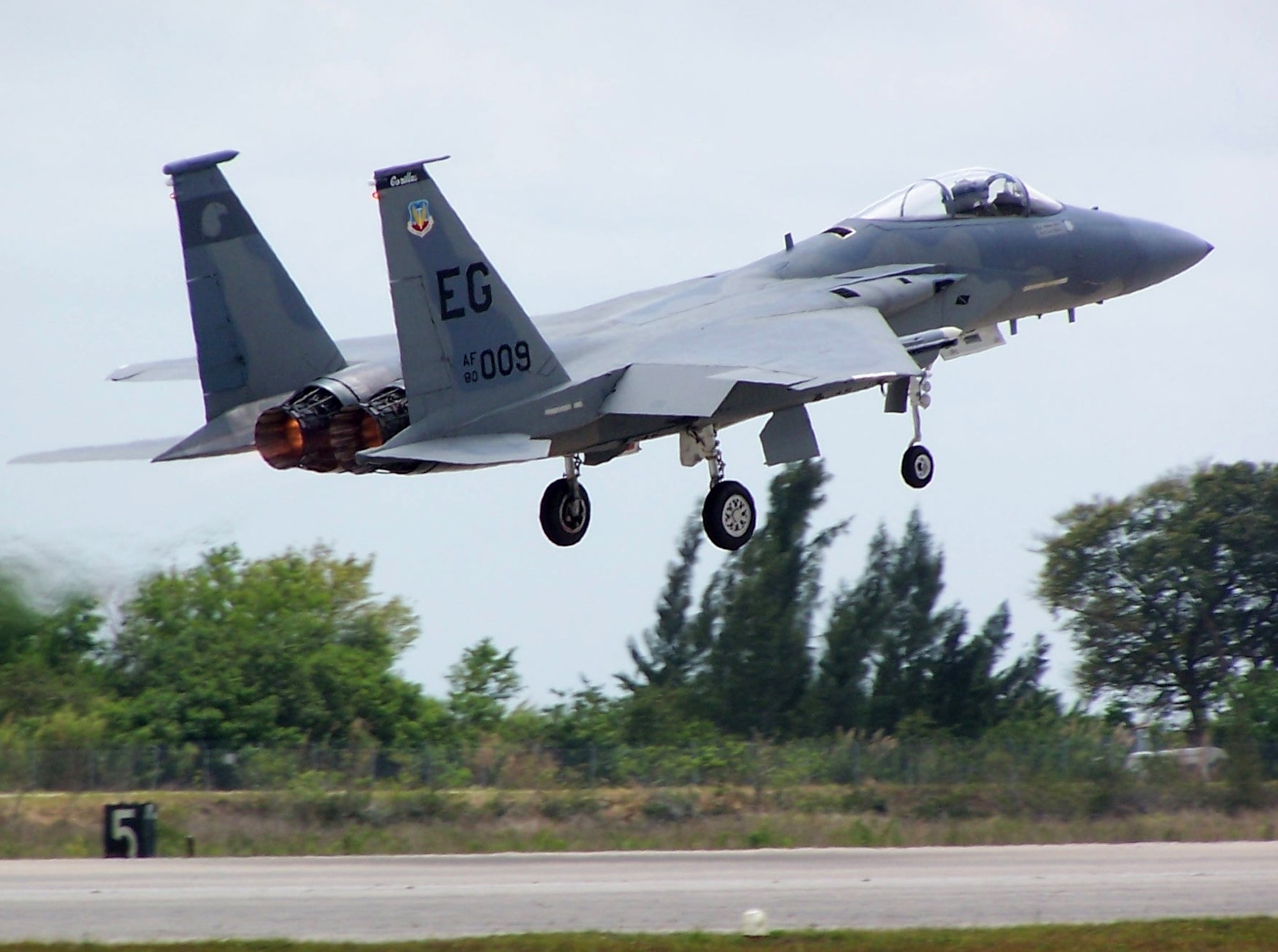 HOMESTEAD AIR RESERVE BASE, Fla. -- An F-15 Eagle takes off from here for a dissimilar aircraft combat training mission against F-16 Fighting Falcons.  The Eagles are assigned to the 58th Fighter Squadron at Eglin Air Force Base, Fla., and the F-16s are from Homestead's 93rd FS.  (U.S. Air Force photo by Capt. John Jacobus)