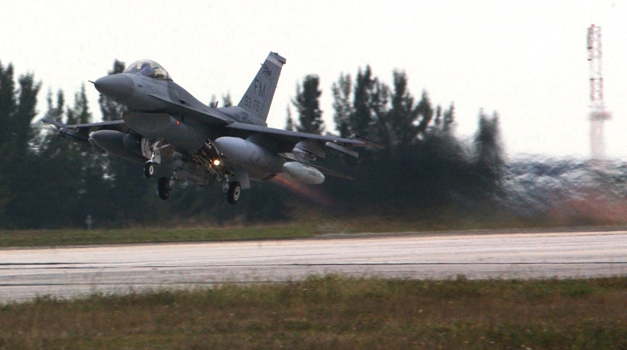 HOMESTEAD AIR RESERVE BASE, Fla. -- An F-16 Fighting Falcon takes off from here for a dissimilar aircraft combat training mission against F-15 Eagles.  The F-16s are assigned to Homestead's 93rd Fighter Squadron, and the F-15s are from the 58th FS at Eglin Air Force Base, Fla.  (U.S. Air Force photo by Lisa Macias)