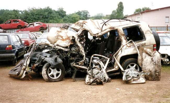 GERMANY -- The mangled 1992 Isuzu Trooper that Master Sgt. Theresa Hall was riding in eight years ago sits at a junk yard shortly after an accident that killed the other four passengers.  Sergeant Hall was the only survivor of the head-on collision with a drunk driver.  (U.S. Air Force photo)