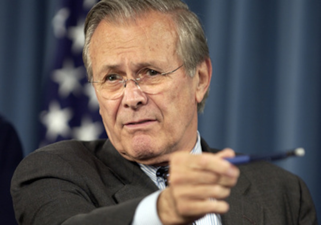 Secretary of Defense Donald H. Rumsfeld answers a reporter's question during a press briefing with Chairman of the Joint Chiefs of Staff Gen. Richard B. Myers, U.S. Air Force, in the Pentagon on April 26, 2005. Rumsfeld and Myers briefed reporters on the situation in Iraq. 