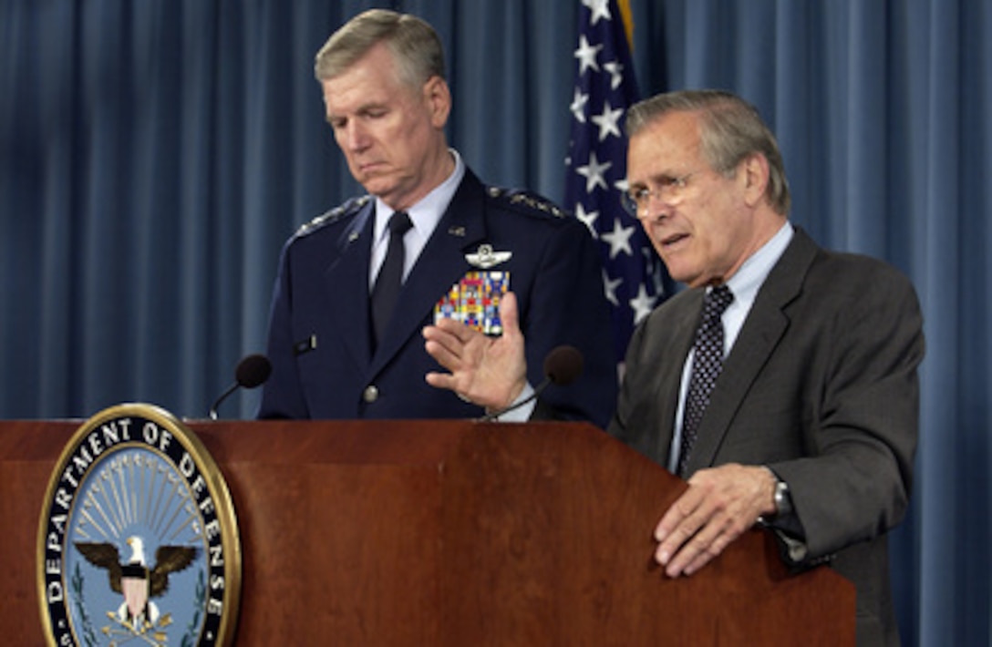 Secretary of Defense Donald H. Rumsfeld answers a reporter's question during a press briefing with Chairman of the Joint Chiefs of Staff Gen. Richard B. Myers, U.S. Air Force, in the Pentagon on April 26, 2005. Rumsfeld and Myers briefed reporters on the situation in Iraq. 
