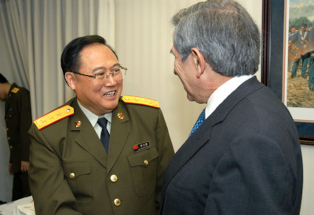 Chinese Deputy Chief of the General Staff Gen. Xiong Guangkai (left) talks with Deputy Secretary of Defense Paul Wolfowitz (right) during the U.S.-China Defense Consultative Talks in the Pentagon on April 28, 2005. 