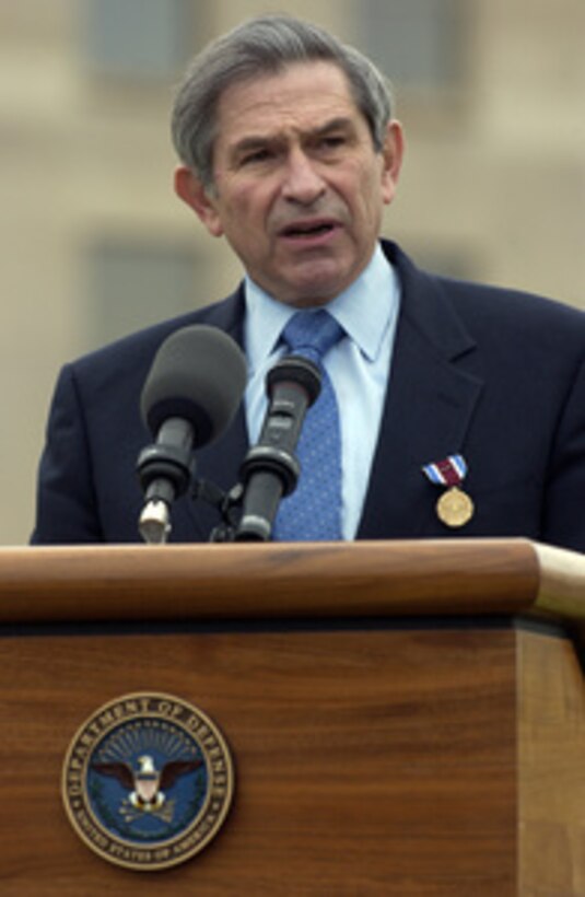 Deputy Secretary of Defense Paul Wolfowitz addresses the audience during his farewell ceremony on the Pentagon River Parade Field on April 29, 2005. Secretary of Defense Donald H. Rumsfeld presented Wolfowitz with the Department of Defense Medal for Distinguished Public Service. Wolfowitz is leaving the Defense Department to become president of the World Bank. 
