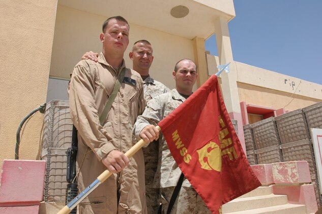 AL ASAD, Iraq - Lieutenant Col. Jay Johnson, the Marine Wing Support Squadron 271 commanding officer, along with Lance Cpls. Lincoln Echard, a bulk fuel specialist and Christopher McCutcheon, an Aircraft Rescue and Fire Fighting crash crewman both with MWSS-271. The three Marines all graduated high school in Washington County, Ohio. Johnson and Echard graduated from Warren High School in 1982 and 2002 respectively while McCutcheon graduated in 2002 from Frontier High School.