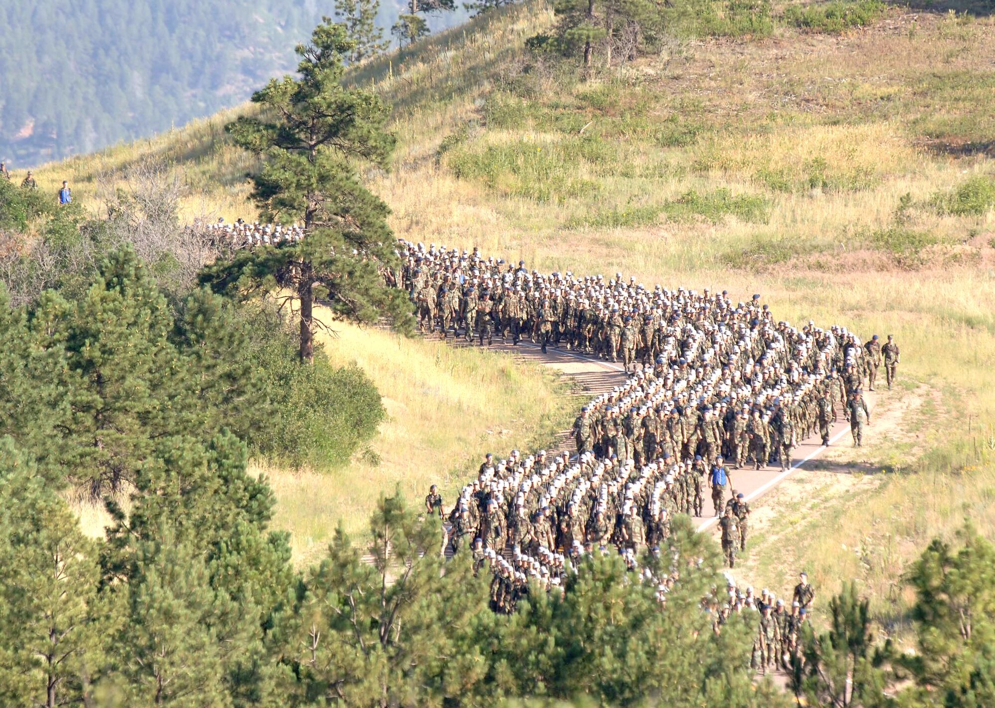 U.S. AIR FORCE ACADEMY, Colo. -- Basic cadets of the class of 2009 march out to Jacks Valley to begin their final phase of basic training. The basic cadets are living in tents for two weeks while participating in a variety of military training exercises before returning to begin the academic year. (U.S. Air Force photo by Charley Starr)