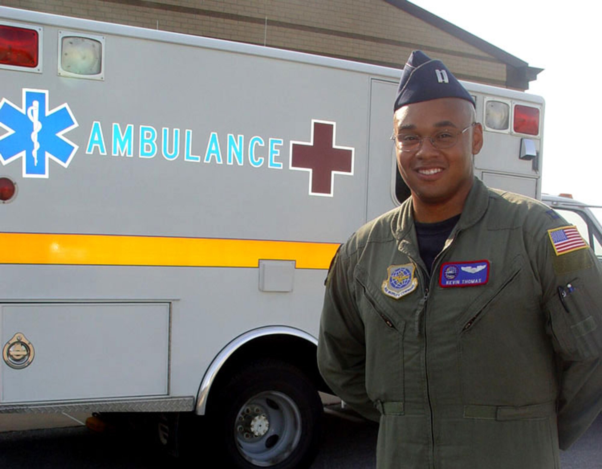 MCCONNELL AIR FORCE BASE, Kan. -- Capt. Kevin Thomas used prior job knowledge to help a young girl who was hit by a car July 28.  Before joining the Air Force, he worked as an emergency medical technician in Virginia.  He is assigned to the 349th Air Refueling Squadron here.  (U.S. Air Force photo by Staff Sgt. Kristine Dreyer)                         