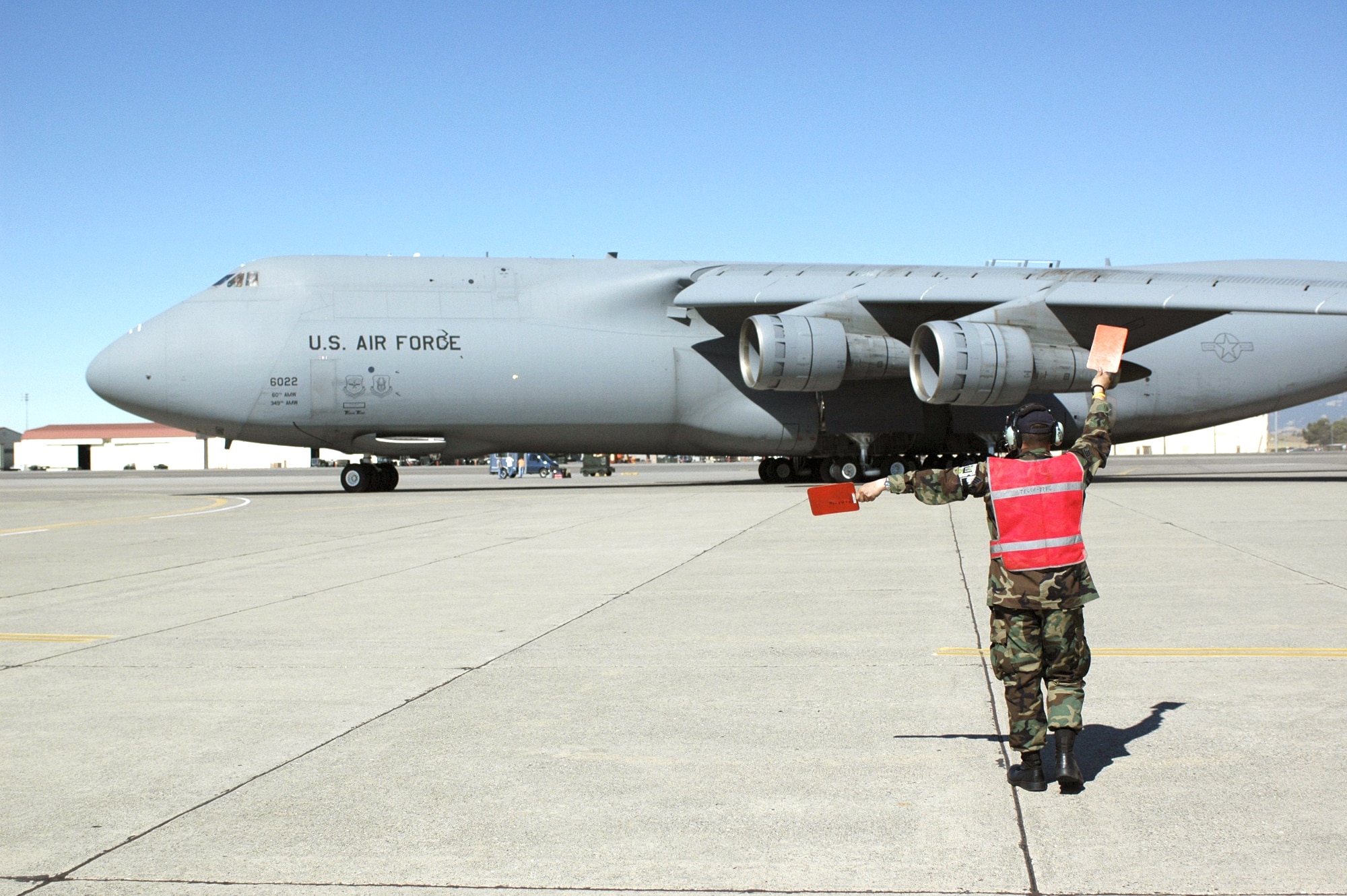 TRAVIS AIR FORCE BASE, Calif. -- A C-5 Galaxy departs here for Naval Air Station North Island, Calif., supporting a humanitarian mission to rescue seven Russian sailors trapped aboard an AS-28 minisubmarine off the Kamchatka peninsula.  Once at NAS North Island, Airmen picked up a team of Sailors and two unmanned rescue vehicles, called Super Scorpios.  The C-5 continued to Russia nonstop with the help of Air Force aerial refueling aircraft.  (U.S. Air Force photo)

 

