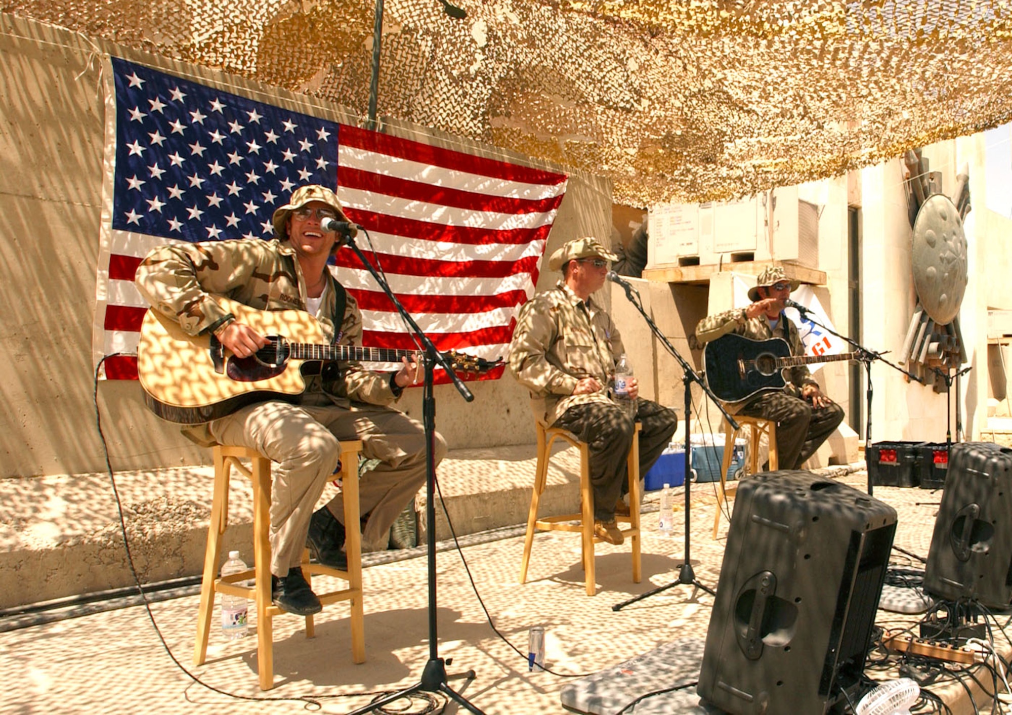 BAGHDAD, Iraq -- Country music group Rascal Flatts performs for Airmen and Soldiers at Baghdad International Airport on Aug. 5 during their United Services Organization tour to support the people supporting Operation Iraqi Freedom.  (U.S. Air Force photo by Tech. Sgt. Brian Davidson)    