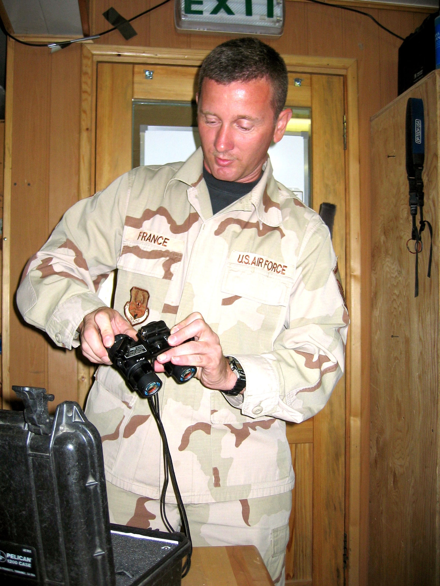 KARSHI-KHANABAD AIR BASE, Uzbekistan -- Master Sgt. Ray France inspects night-vision goggles after an aircrew returns.  He is an aircrew life support technician with the 774th Expeditionary Airlift Squadron and is deployed from Carswell Field, Texas.  (U.S. Air Force photo by Staff Sgt. Shad Eidson)