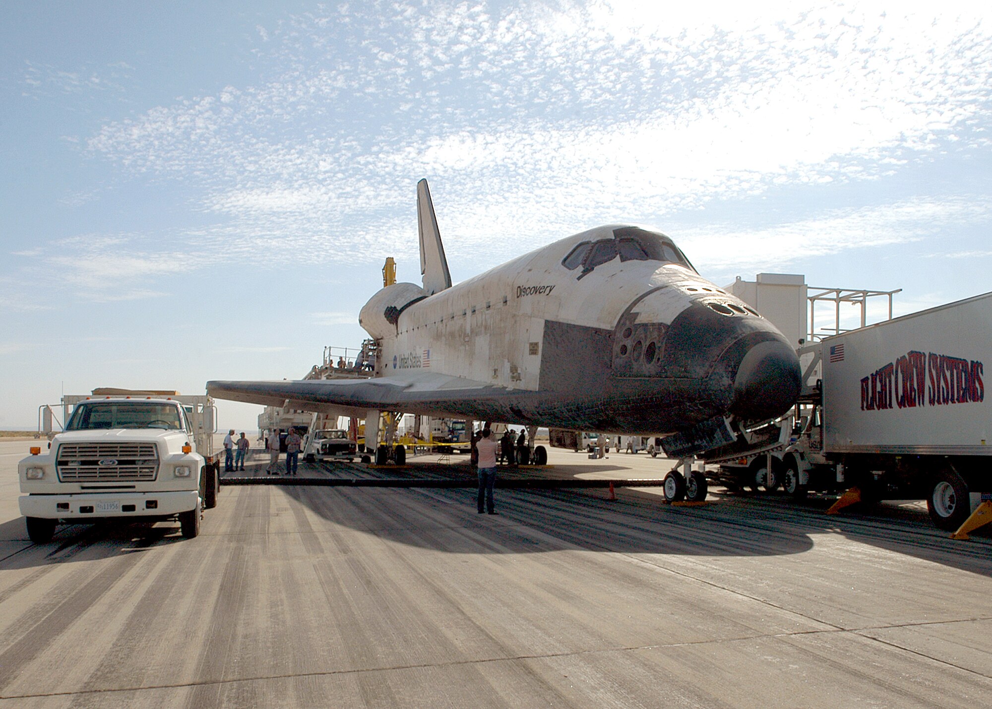 EDWARDS AIR FORCE BASE, Calif. -- Space Shuttle Discovery sits at the end of the runway here after its safe landing Aug. 9. The shuttle returned from a 14-day mission in space. (U.S. Air Force photo by Senior Airman Jet Fabara)