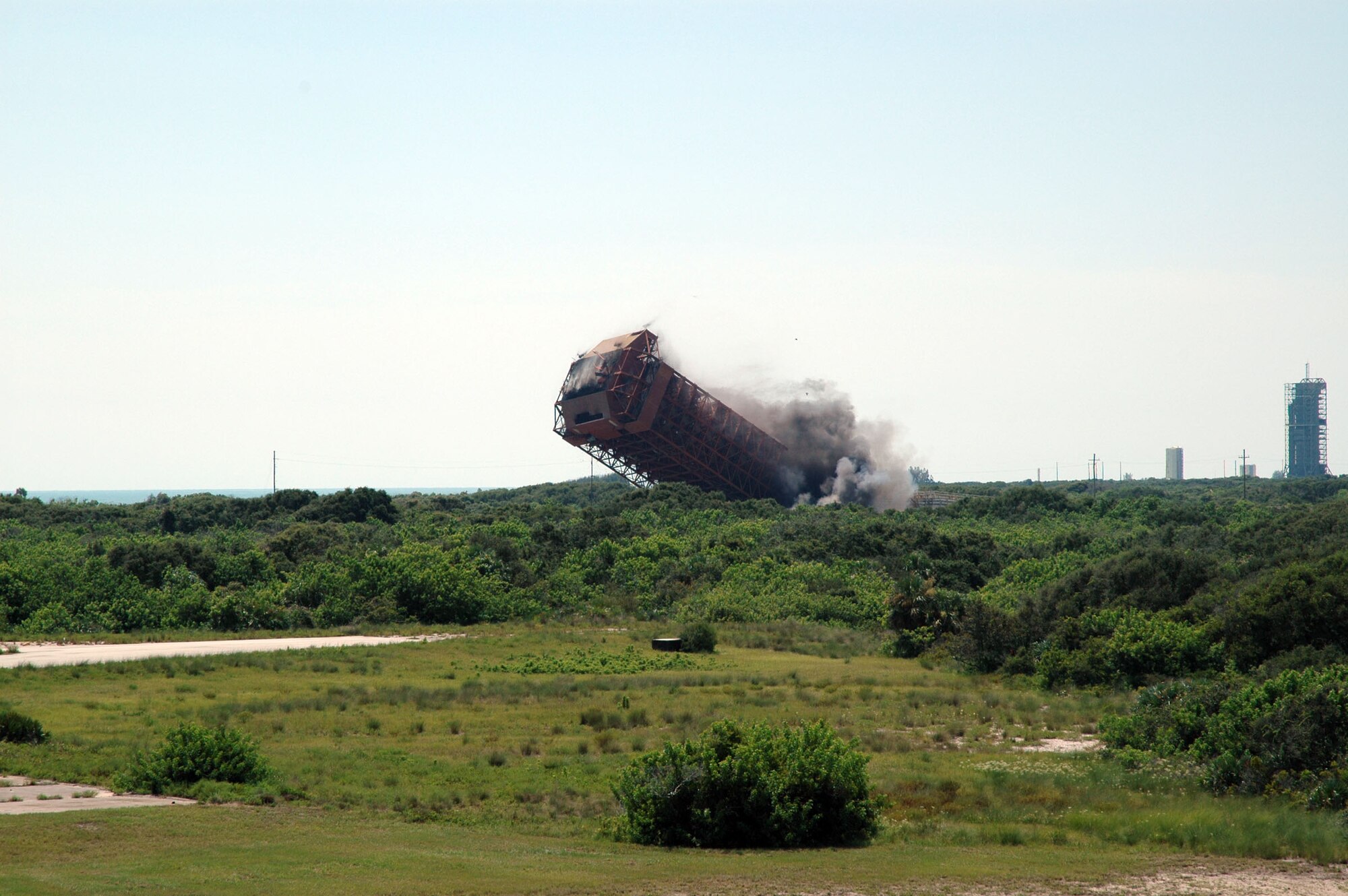 CAPE CANAVERAL AIR FORCE STATION, Fla. -- A 1,300-ton structure here is demolished Aug. 6.  The 179-foot mobile service tower was used to launch 51 Atlas/Agena space launch vehicles in the 1960s and 1970s.  (U.S. Air Force photo)