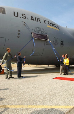 MARCH AIR RESERVE BASE, Calif. -- (From left) Brig. Gen. James Rubeor, Ron Marcott, Rep. Ken Calvert, Maj. Gen. Robert E. Duignan and Rep. Juanita Millender-McDonald unveil the "Spirit of California." Air Force Reserve Command's first C-17 Globemaster III arrived here Aug. 9. General Rubeor is the 452nd Air Mobility Wing commander, Mr. Marcott is the Boeing airlift and tanker vice president, and General Duignan is the 4th Air Force commander. (U.S. Air Force photo by Tech. Sgt. Thomas P. Dougherty)
