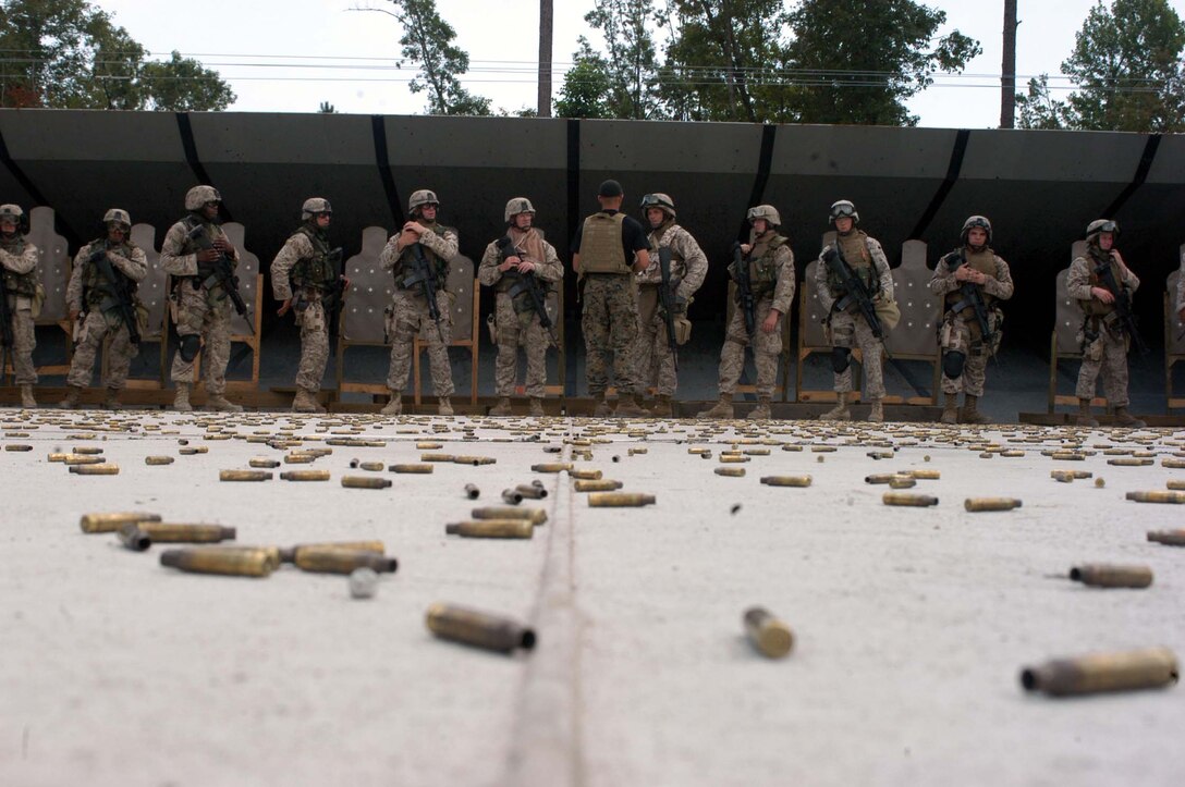 AL ASAD, Iraq ? Lance Cpl. Teddy Brown, an airframes and hydraulics mechanic with Marine Light/Attack Helicopter Squadron 269 and Munising, Mich., native, checks a section of an AH-1W Super Cobra on Aug. 11. Brown is a 2001 graduate of Munising High School.