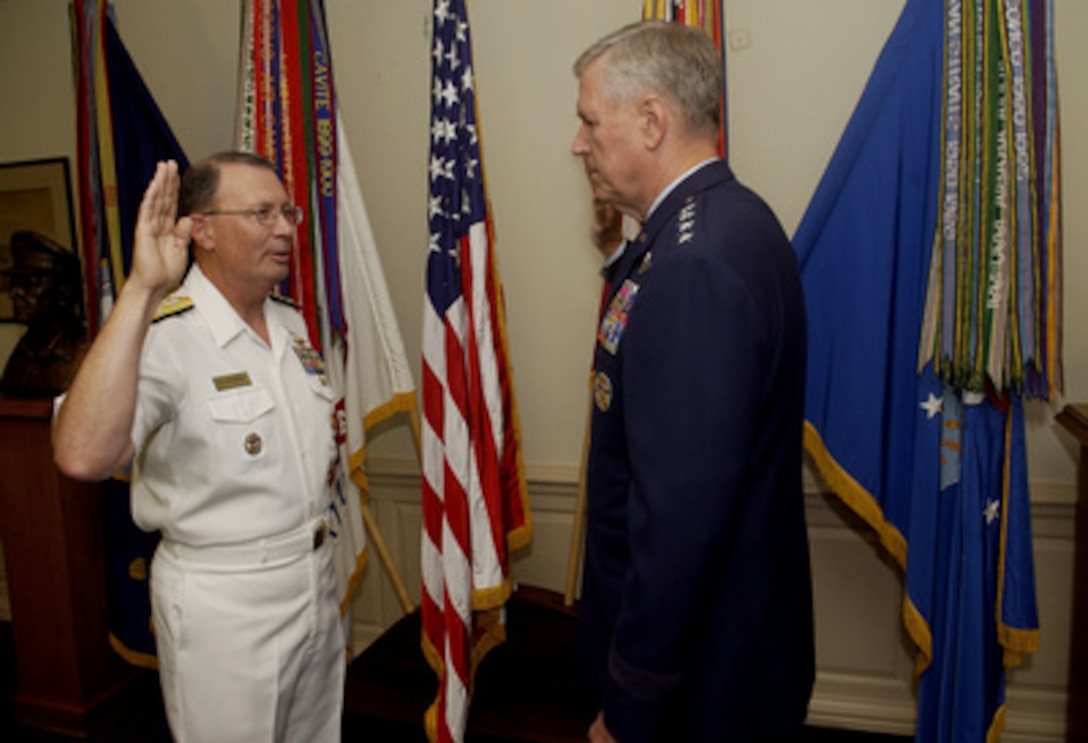 Adm. Edmund P. Giambastiani Jr. (left), U.S. Navy, is administered the oath of office as the 7th Vice Chairman of the Joint Chiefs of Staff by the Chairman of the Joint Chiefs of Staff Gen. Richard B. Myers, U.S. Air Force, during a Pentagon ceremony on Aug. 12, 2005. Giambastiani succeeds Marine Gen. Peter Pace as the nation's second highest-ranking military officer. 