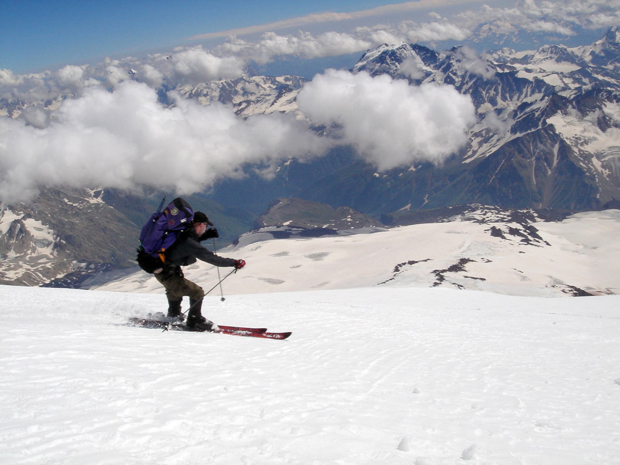 MOUNT ELBRUS, Russia -- Capt. Rob Marshall skis the Garabashi Glacier during his descent from the summit of Mount Elbrus.  He is assigned to the 67th Special Operations Squadron at Royal Air Force Mildenhall, England.  (U.S. Air Force photo by 1st Lt. Mark Uberuaga)