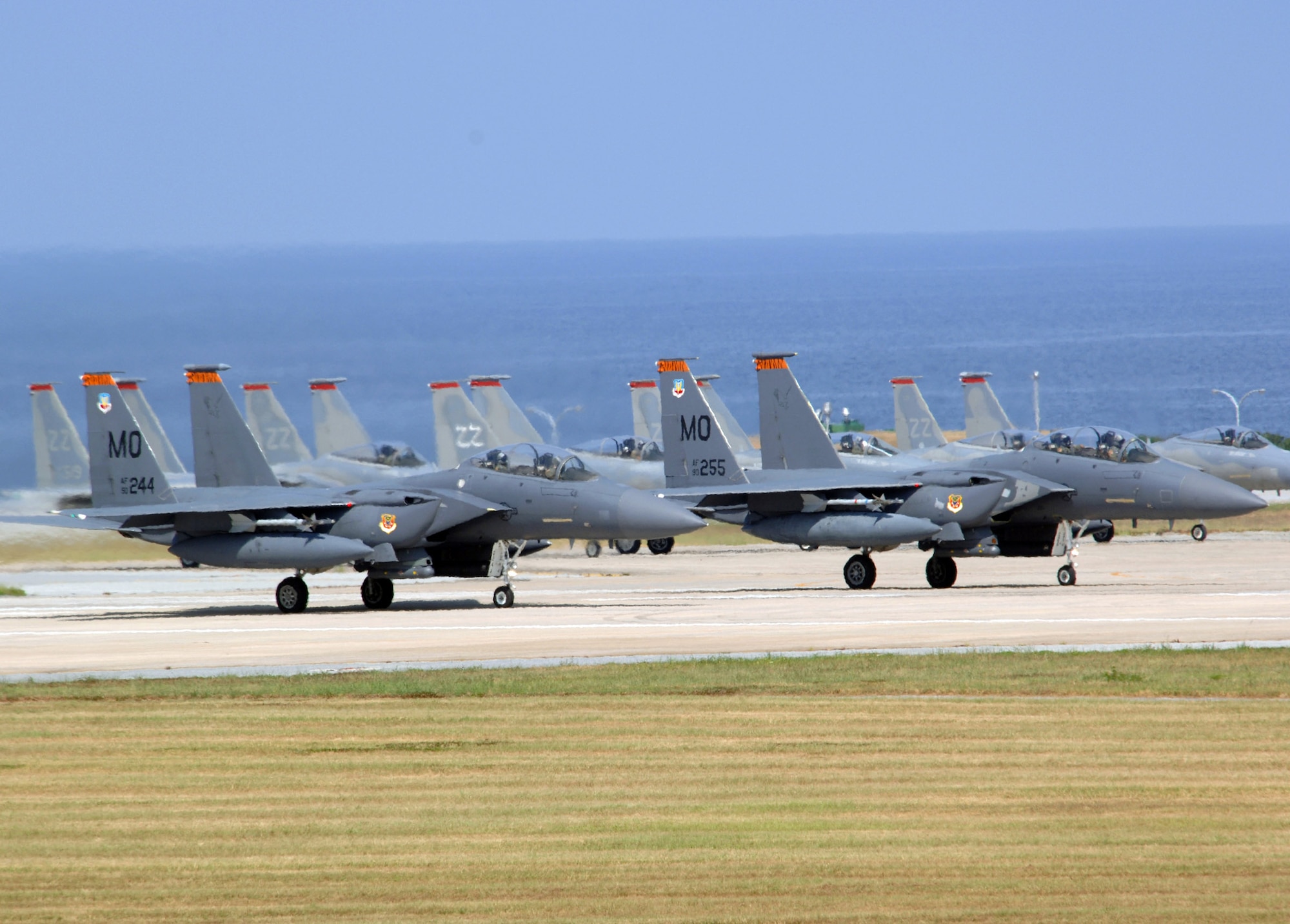 KADENA AIR BASE, Japan -- F-15E Strike Eagles with the 391st Expeditionary Fighter Squadron deployed from Mountain Home Air Force Base, Idaho, and 18th Wing here prepare to take off for a training mission.  About 300 Airmen from Mountain Home are here supporting U.S. Pacific Command operations as part of an air and space expeditionary force tasking.  (U.S. Air Force photo by Master Sgt. Val Gempis)