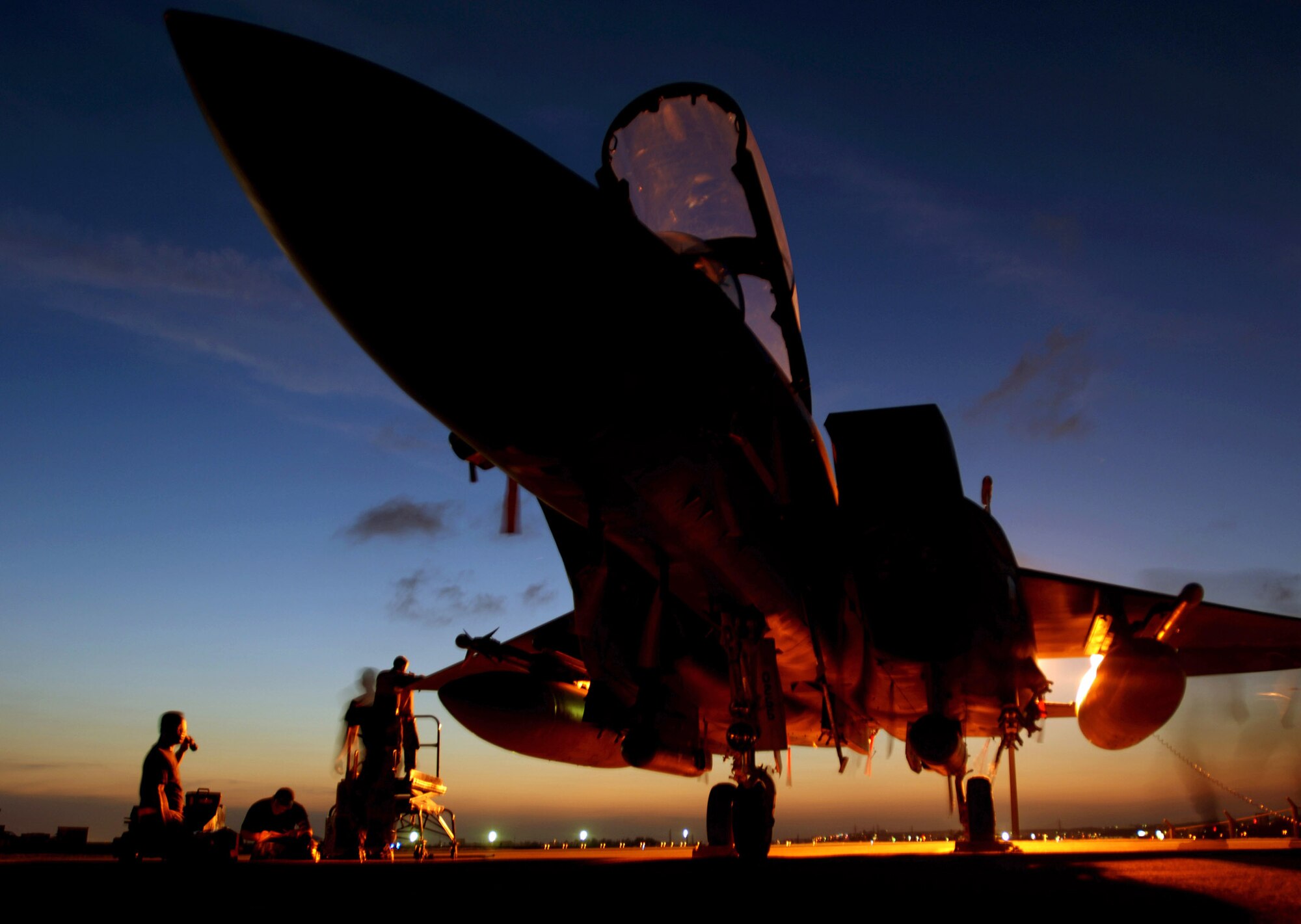 KADENA AIR BASE, Japan -- Maintainers from the 391st Expeditionary Fighter Squadron inspect their F-15E Strike Eagle aircraft.  About 300 Airmen from Mountain Home Air Force Base, Idaho, are here supporting U.S. Pacific Command operations as part of an air and space expeditionary force tasking.  (U.S. Air Force photo by Master Sgt. Val Gempis)