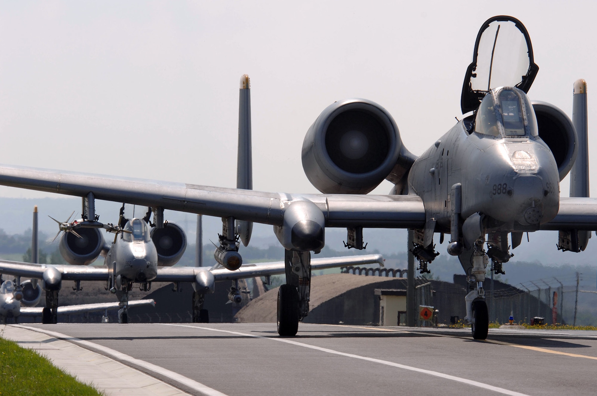 SPANGDAHLEM AIR BASE, Germany -- Taking advantage of a sunny German day, A-10 Thunderbolt II aircraft taxi toward takeoff from this fighter base. The 81st Fighter Squadron's A-10 Thunderbolt II aircraft, the only ones stationed in U.S. Air Forces in Europe, work closely with NATO countries. The aircraft's capabilities are sought after by U.S. and NATO ground forces to provide close-air support, interdiction and combat search and rescue. (U.S. Air Force photo by Senior Master Sgt. Keith Reed)