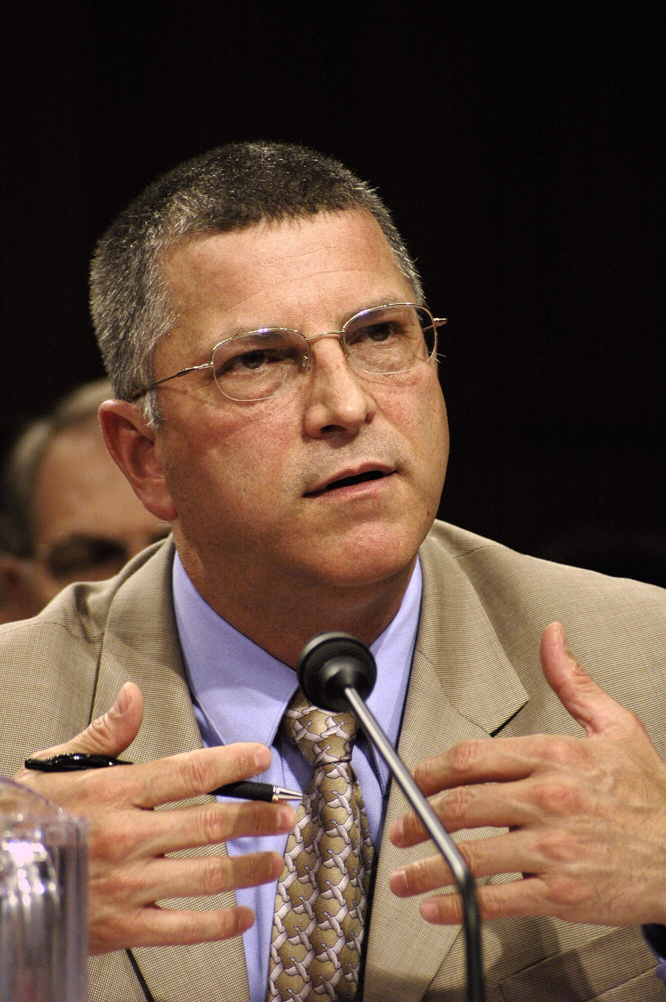 WASHINGTON -- Michael L. Dominguez testifies before the Base Realignment and Closure commission Aug. 11.  Mr. Dominguez told BRAC commissioners the Air Force fleet will become smaller if the service's BRAC recommendations are approved. He also said new aircraft like the F/A-22 Raptor will compensate for the smaller fleet because the Raptor is far more capable than the aircraft it is designed to replace.  Mr. Dominguez is the assistant secretary of the Air Force for Manpower and Reserve Affairs.  (U.S. Air Force photo by Staff Sgt. C. Todd Lopez)