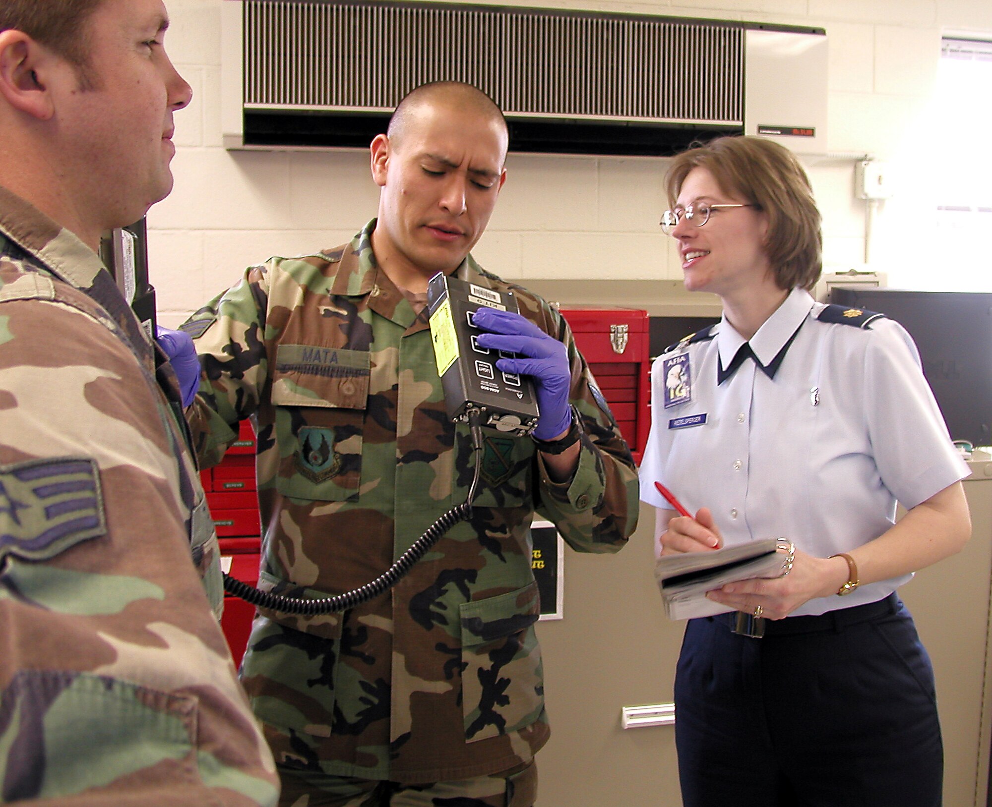 KIRTLAND AIR FORCE BASE, N.M. -- Maj. Cynthia Redelsperger ensures medics can properly monitor for radiation contamination.  She is an Air Force Inspection Agency inspector here. (U.S. Air Force photo by Capt. Gabe Johnson)