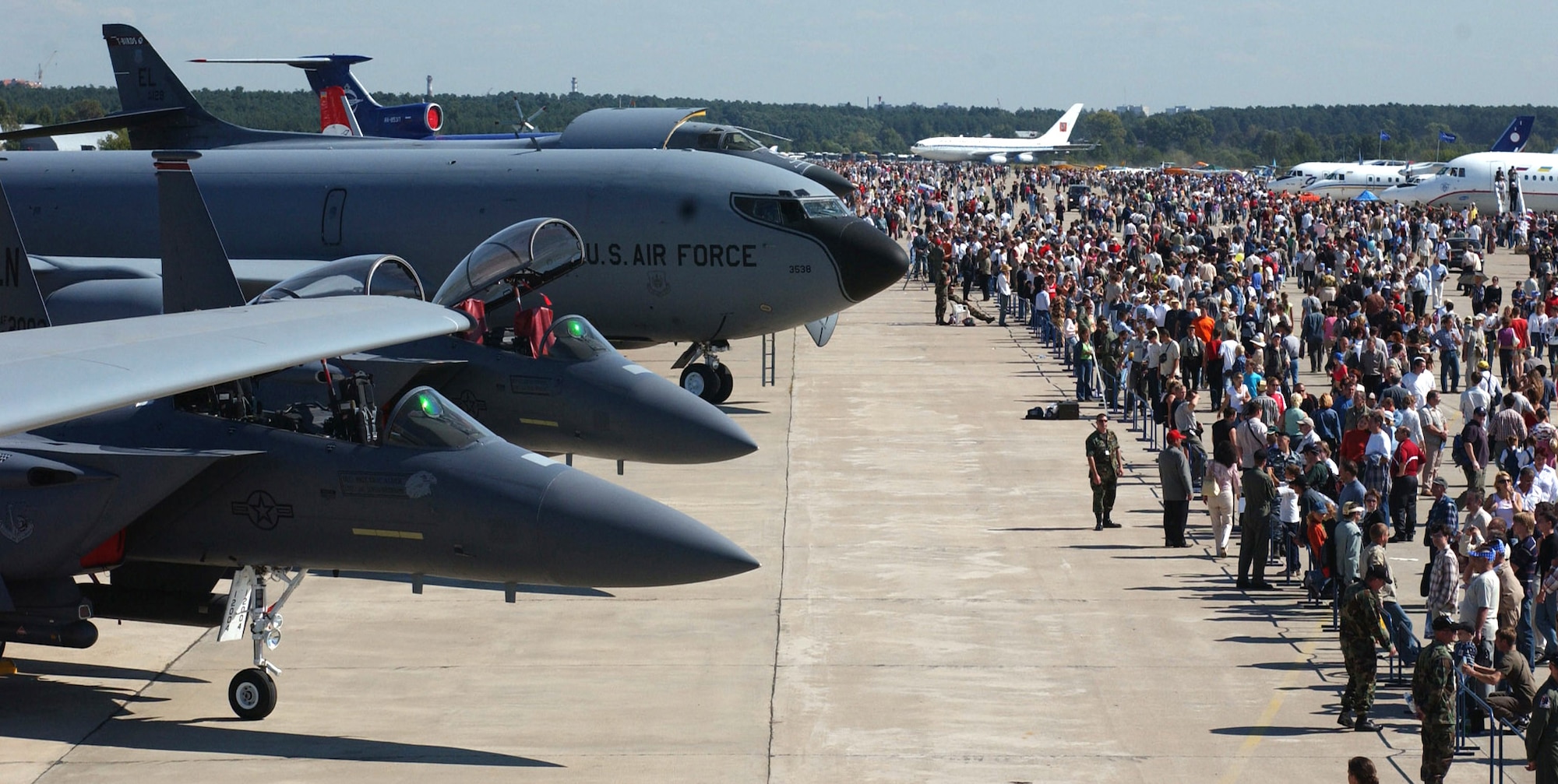 ZHUKOVSKY, Russia -- Two American F-15E Strike Eagles, a KC-135 Stratotanker and a B-1B Lancer sit as static displays on Ramenskoye Airfield here Aug. 21 during the Moscow International Aviation and Space Salon. Air show officials estimated that more than 750,000 people attended the six-day air show here.  U.S. Air Force photo by Master Sgt. Mona Ferrell)